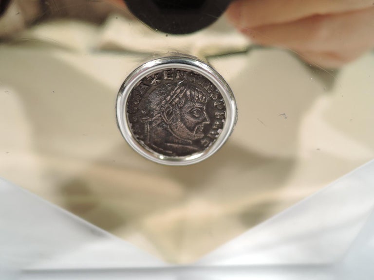 Modern 950 silver box inset with ancient Roman coins. Made by Bulgari in Italy in 1972. Straight sides, each with large gilt diaper inset with a follis (a type of bronze coin) from the reign of Emperor Maxentius, one of the last pagan emperors, who