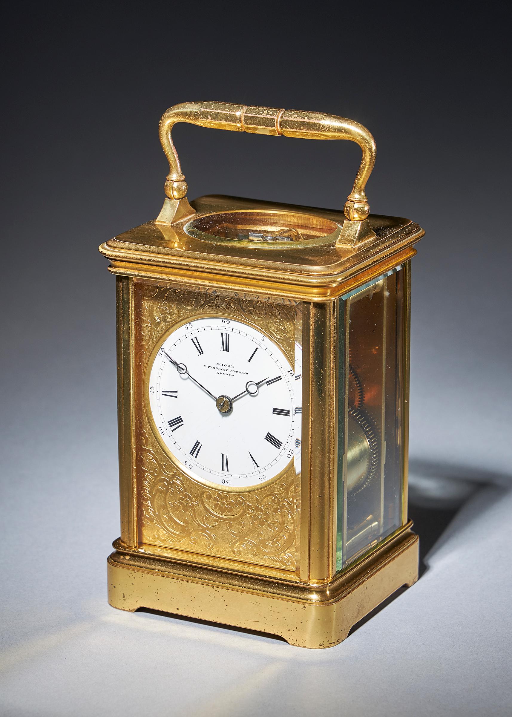 Striking carriage clock with a gilt-brass corniche case by Grohé, circa 1880.

A most attractive eight-day striking carriage clock, signed on the enamel dial GROHÉ 7 WIGMORE STREET LONDON, circa 1870. This is almost certainly a French clock made