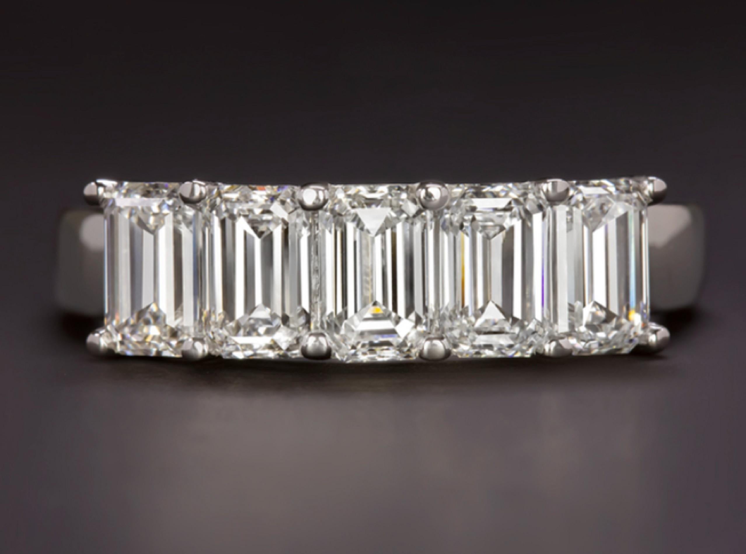Modern Striking 2 Carat Emerald Cut Diamond Band Ring For Sale
