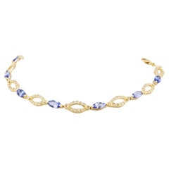 Striking 2.10ctw Tanzanite and Diamond Bracelet in 14K Gold