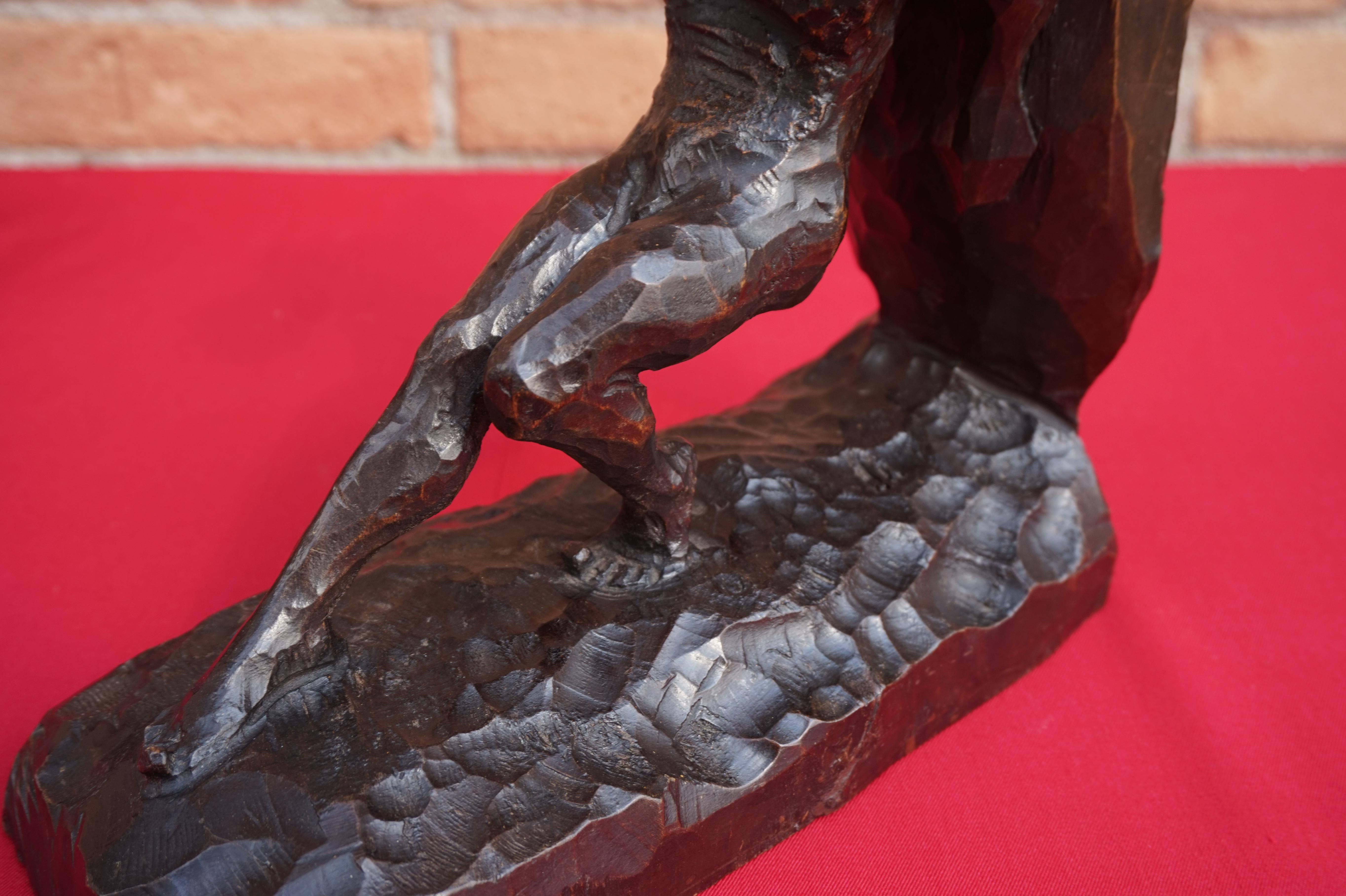 Striking and Hand Carved Art Deco Athletic Nude Male and Rock Sculpture Bookends In Excellent Condition In Lisse, NL