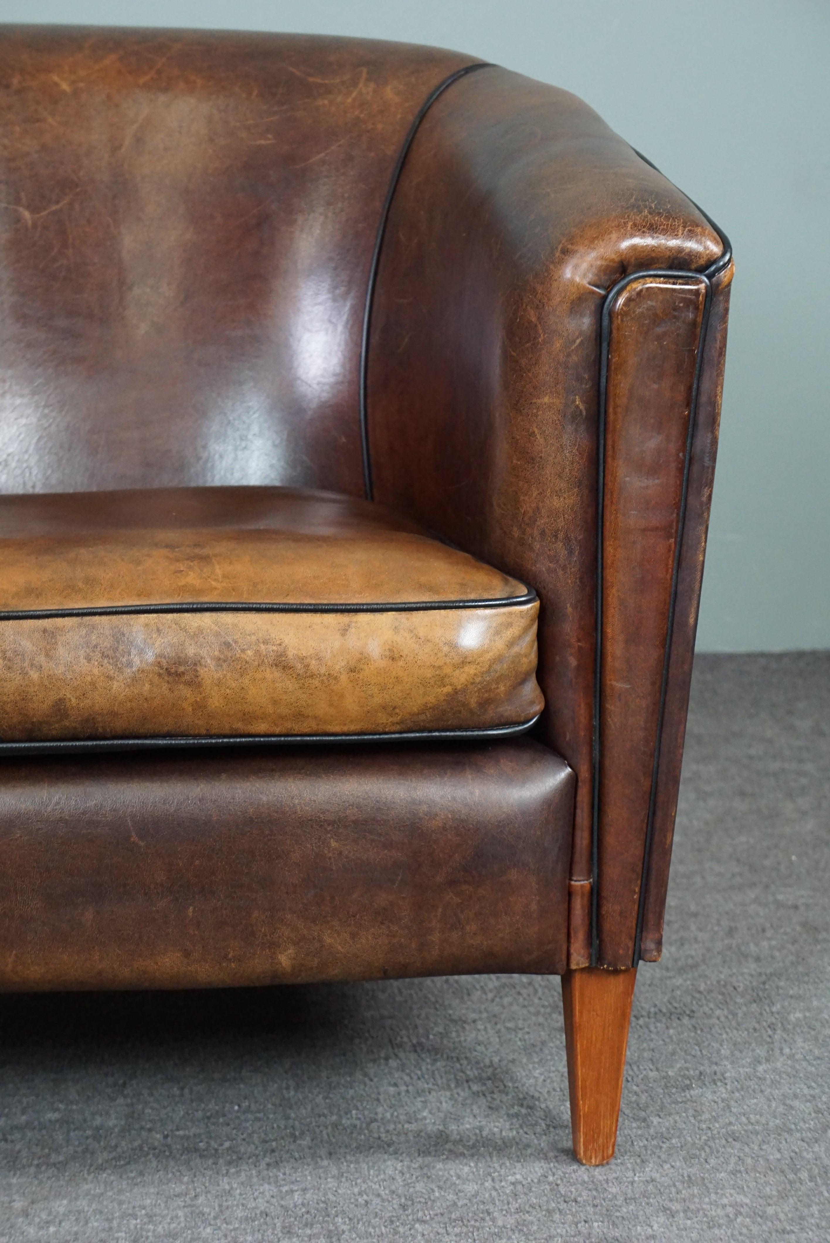 Striking and sleekly designed sheep leather club armchair For Sale 1