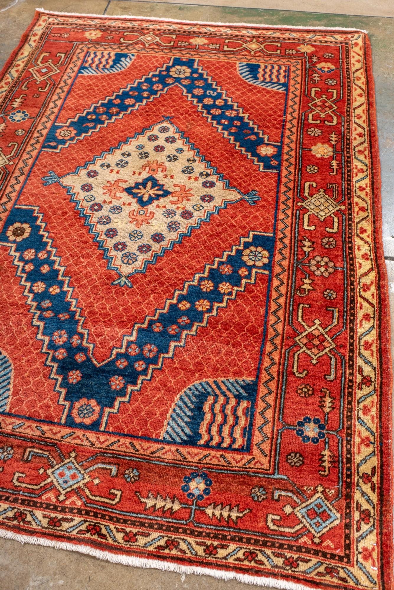 Turkmen Striking Antique Khotan Rug with a Center Medallion For Sale
