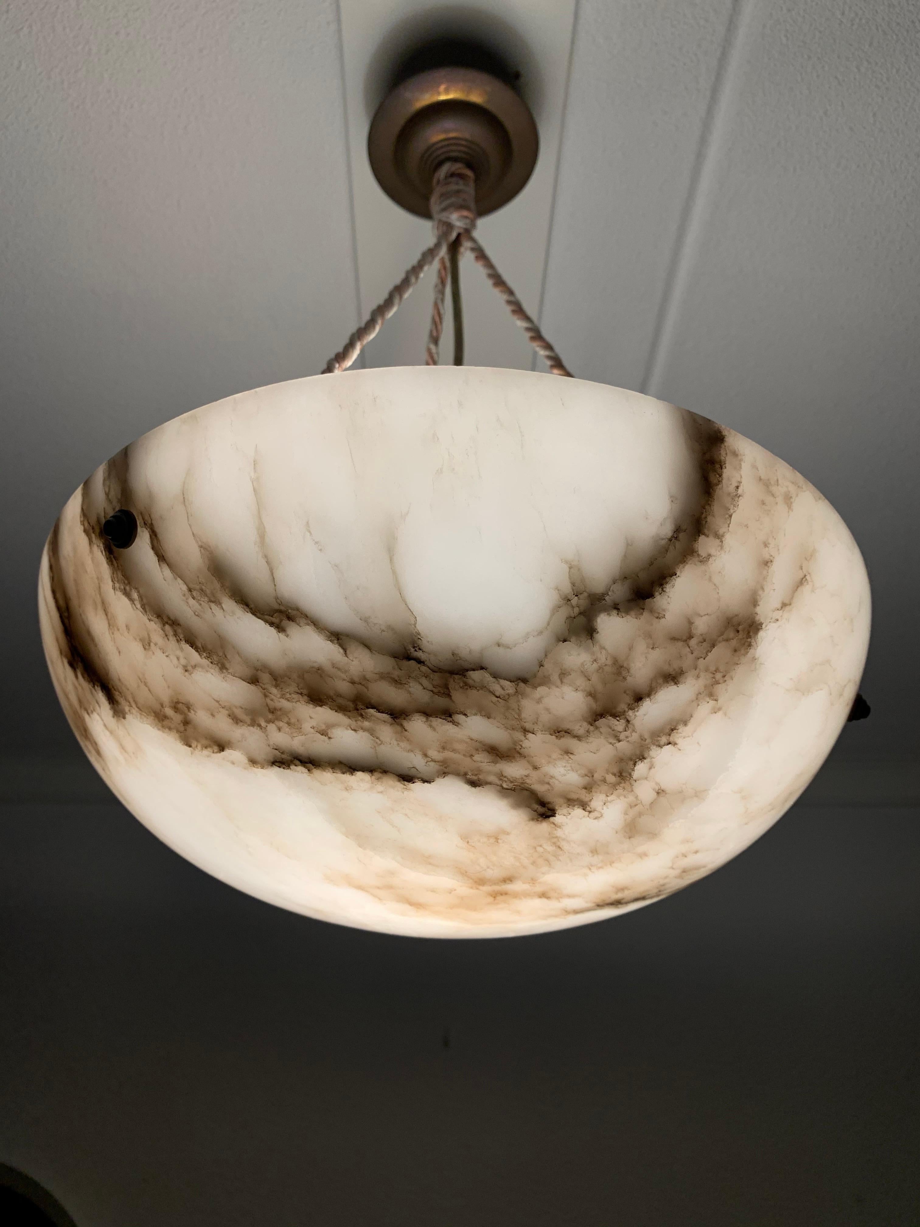 Marvelous antique light fixture for an entry hall, bedroom or any other small room.

But also provides enough light for a large room.
With early 20th century light fixtures being one of our specialties, we always love finding timeless pendants and