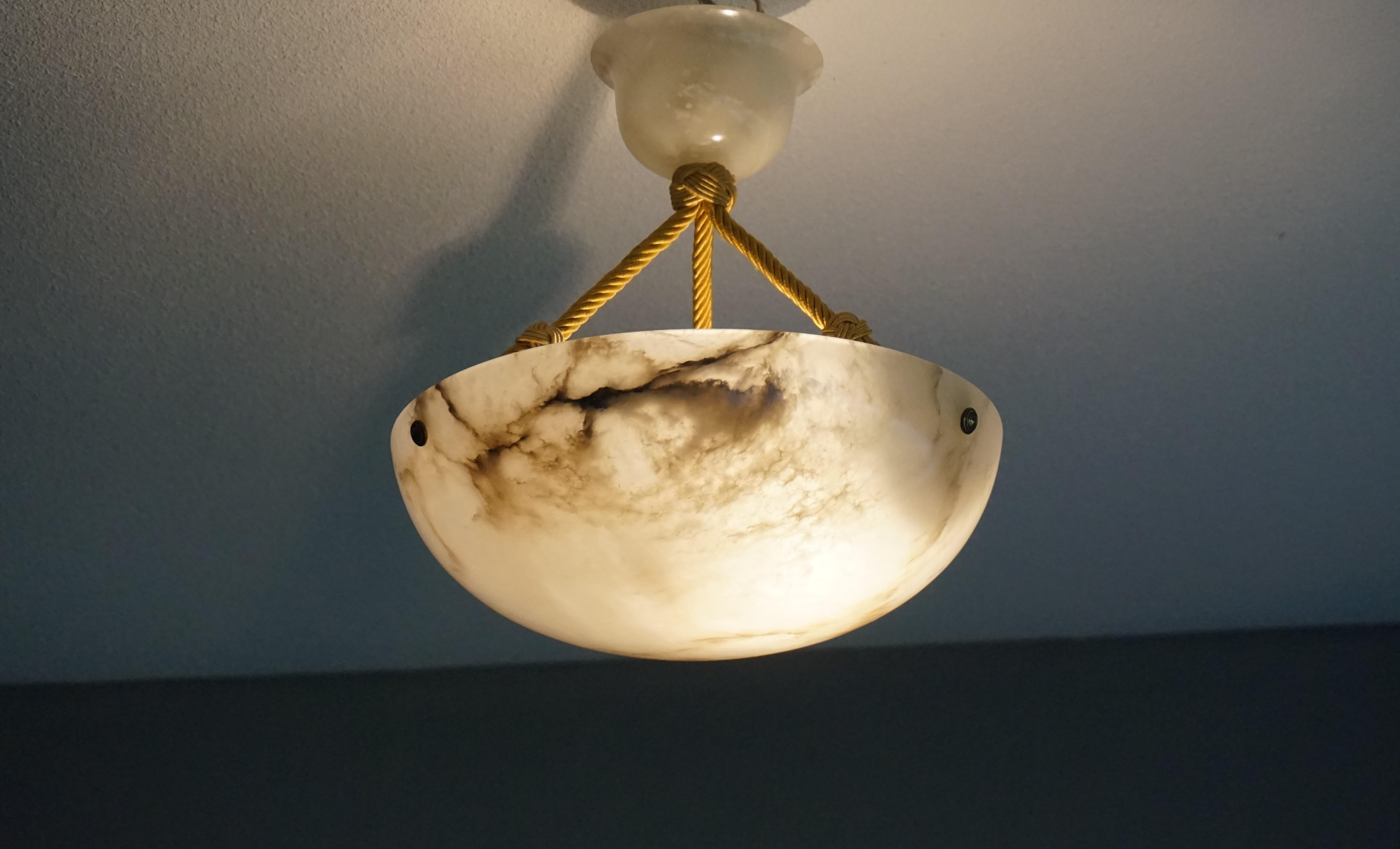 Marvelous antique light fixture for an entry hall, bedroom or any other small room.

With early 20th century light fixtures being one of our specialties, we always love finding timeless pendants and flush mounts we have never seen before. This