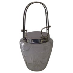 Llamativa galletera automática de plata y cristal tallado