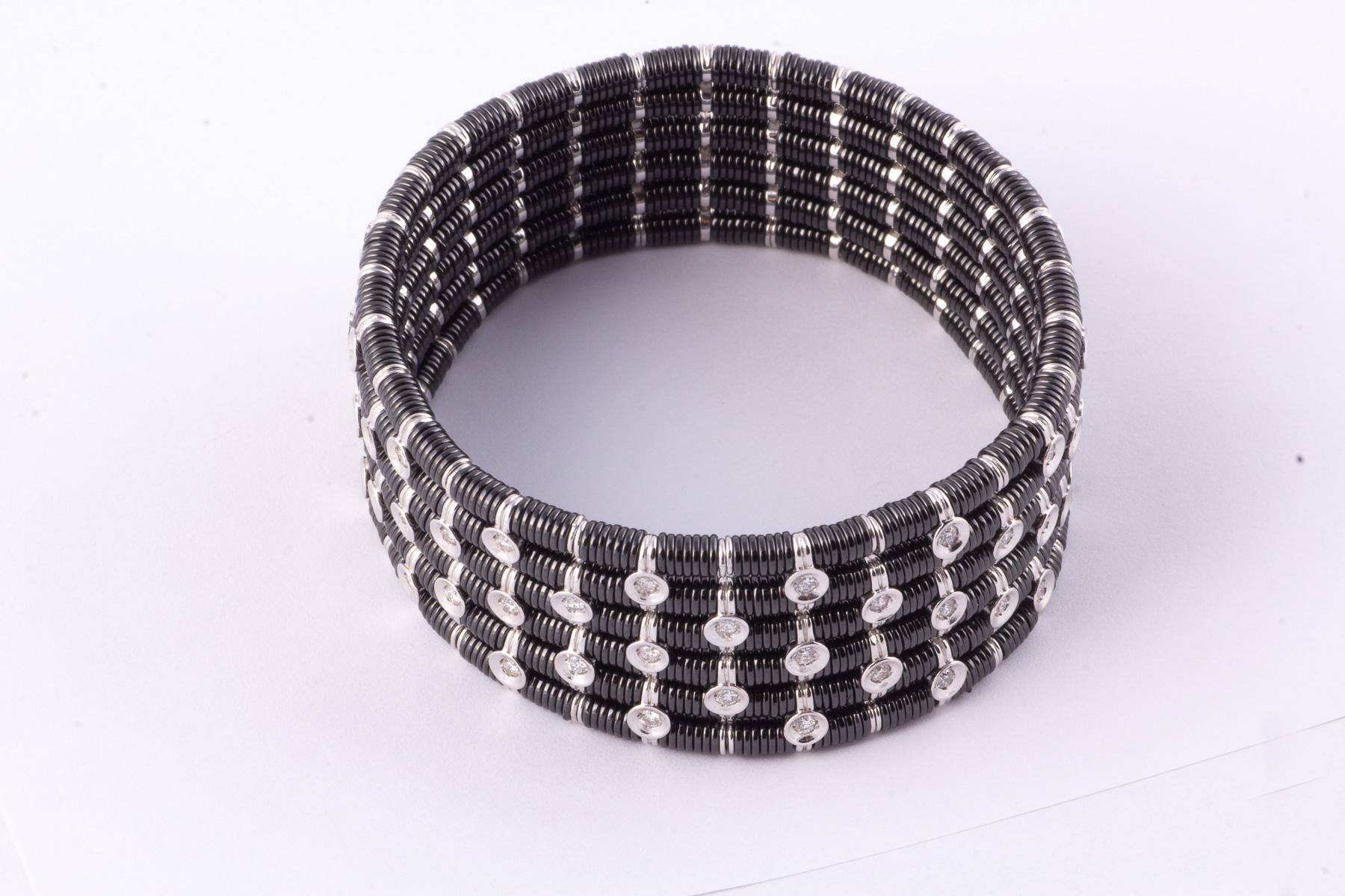 Striking Black Ceramic, 18 Karat White Gold and Diamond Stretch Bracelet In Excellent Condition For Sale In New Orleans, LA