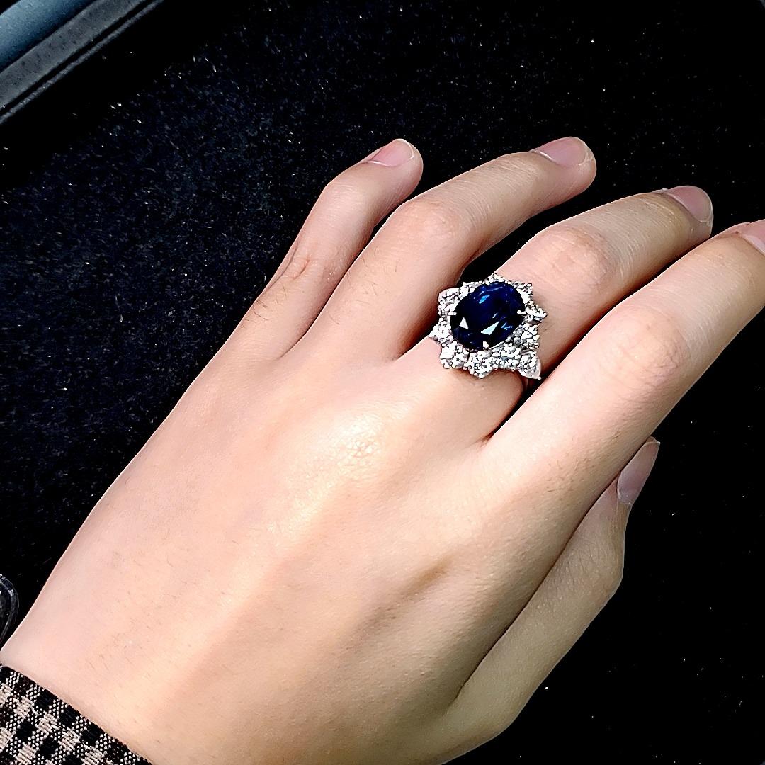 Women's Blue Sapp Platinum Engagement Ring with Excellent Make Diamond Surround For Sale