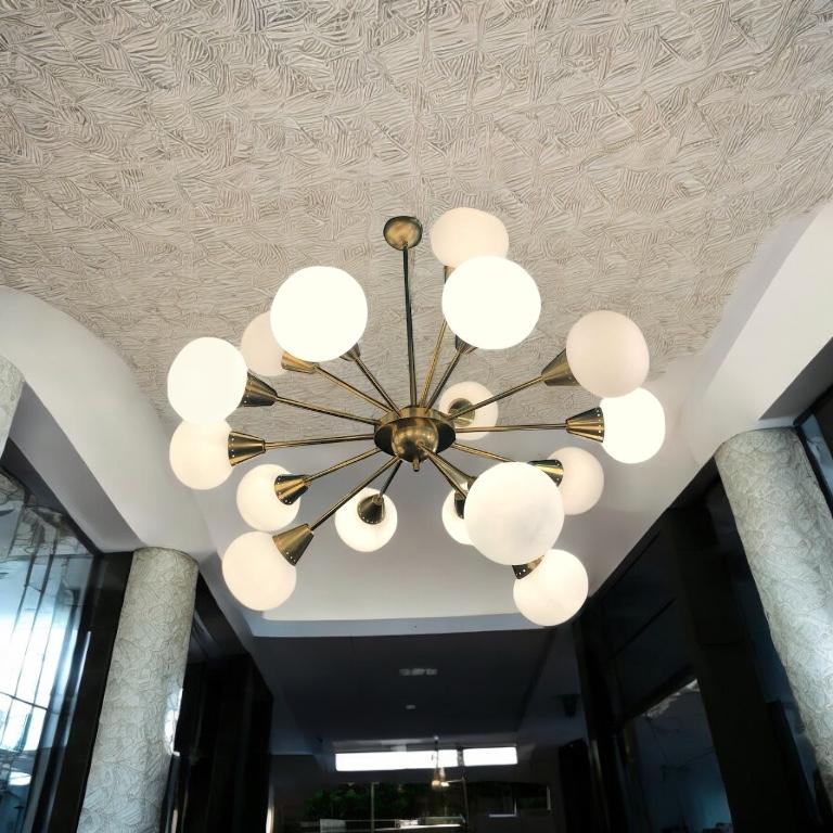 Striking Brass and Opaline Murano Glass Large Sputnik Chandelier Italy 1970' For Sale 1