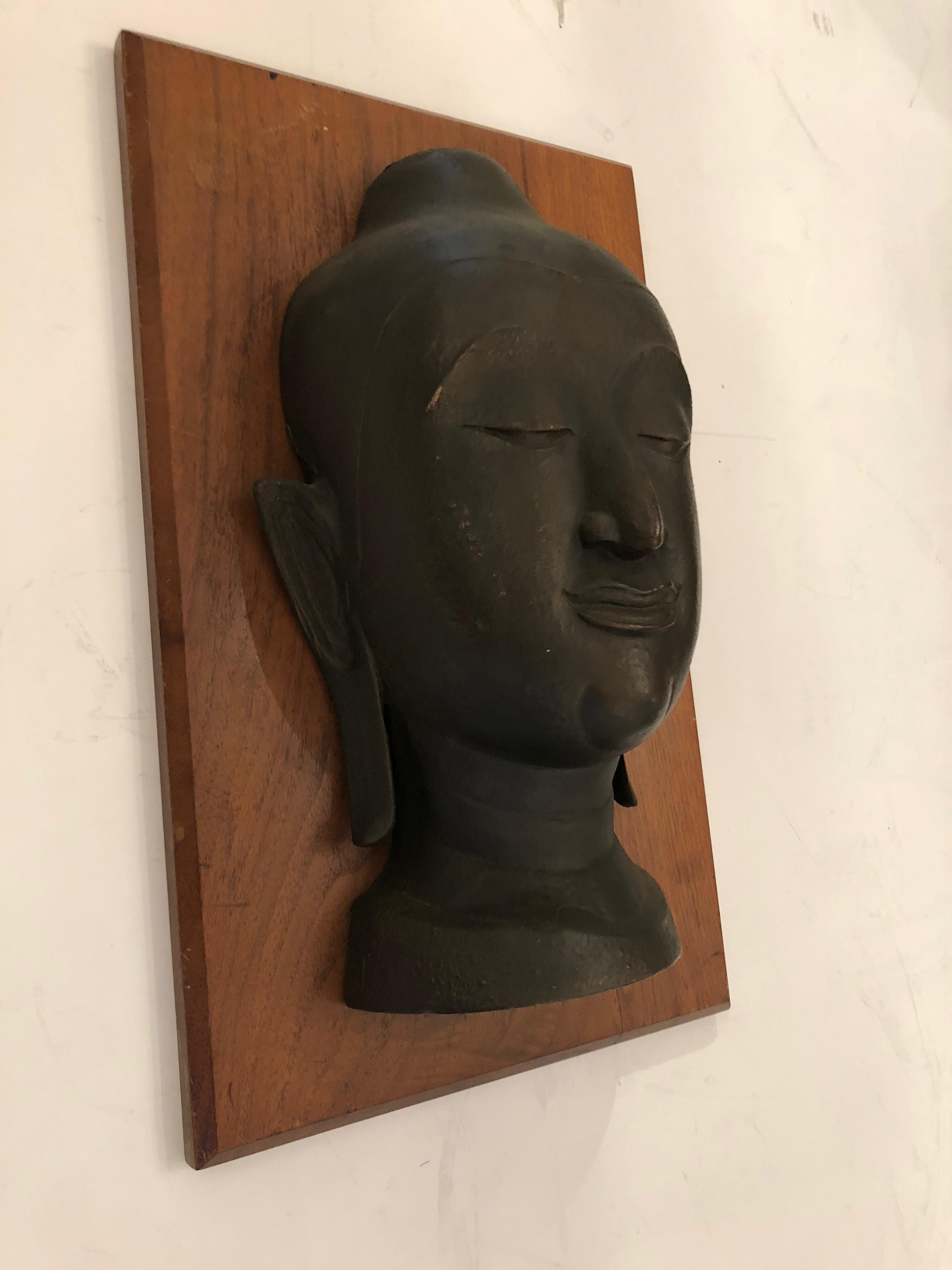 Early 20th Century Striking Bronze Bust of Buddha on Walnut Plaque For Sale
