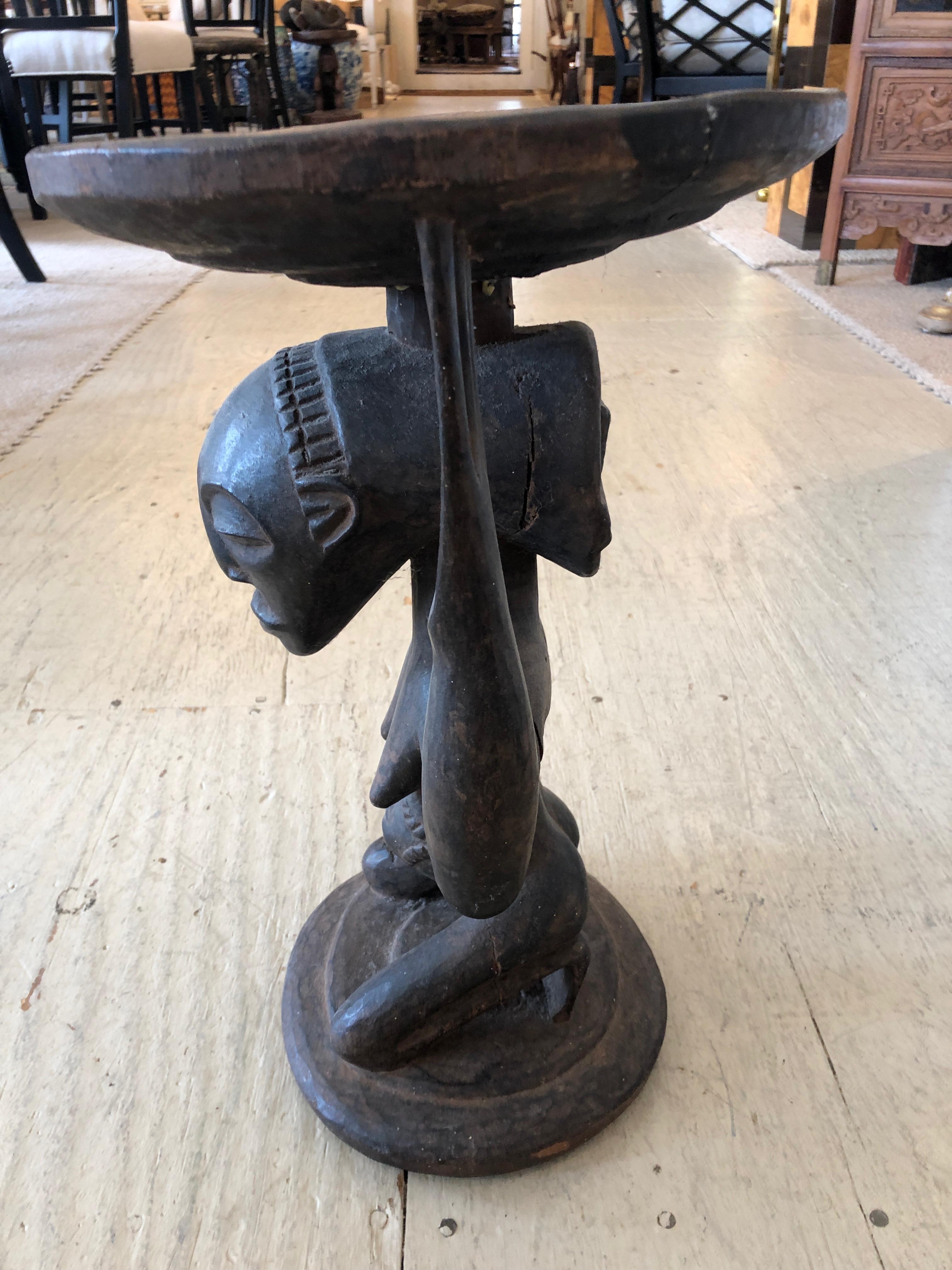 Striking Carved Wood African Figural Small Accent Table In Excellent Condition In Hopewell, NJ