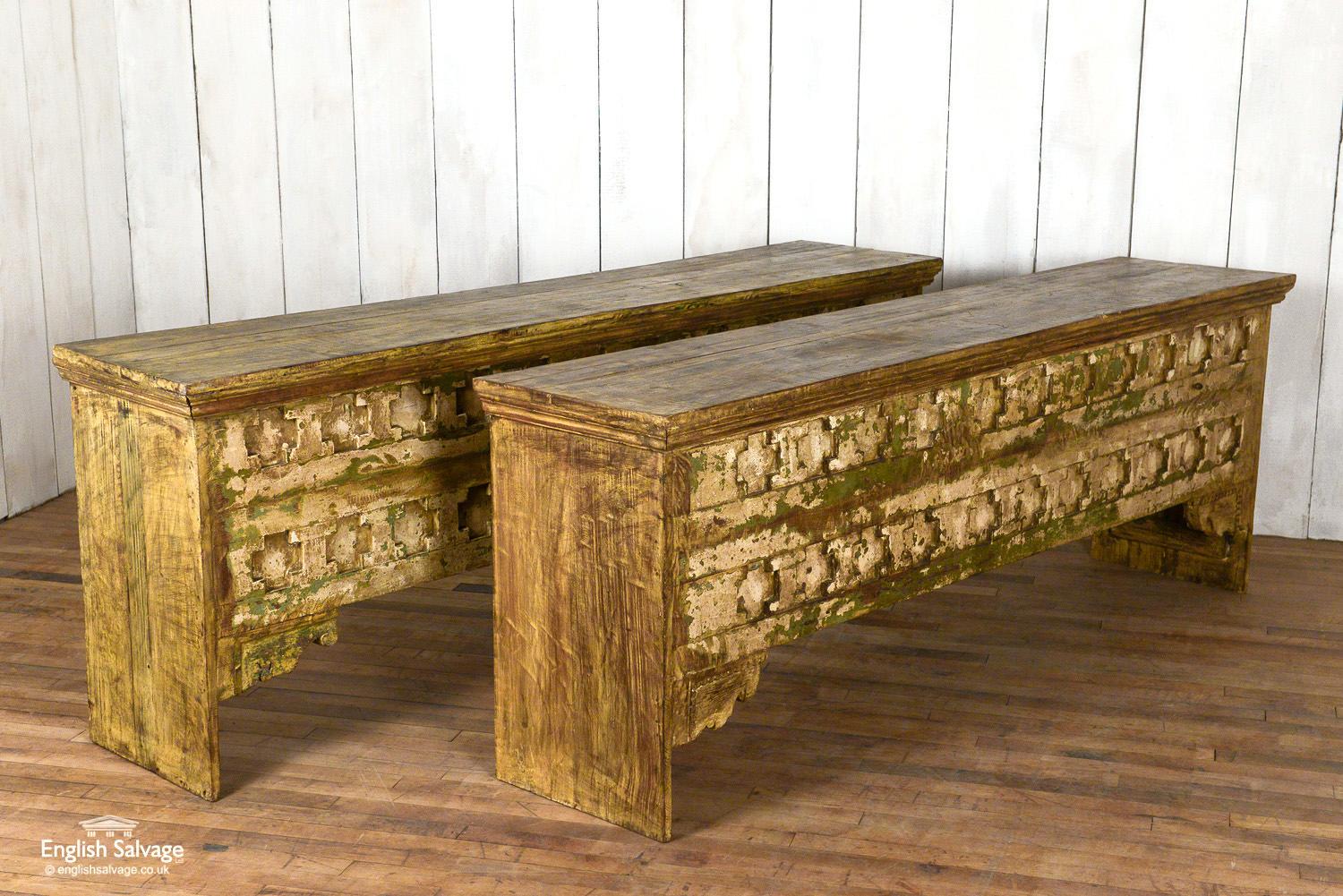 Striking console table made from reclaimed teak. This is a very unusual table with a geometric relief design to the front. The naïve construction is enhanced by paint remnants and saw marks. It has a weathered appearance and at over 2m wide is an