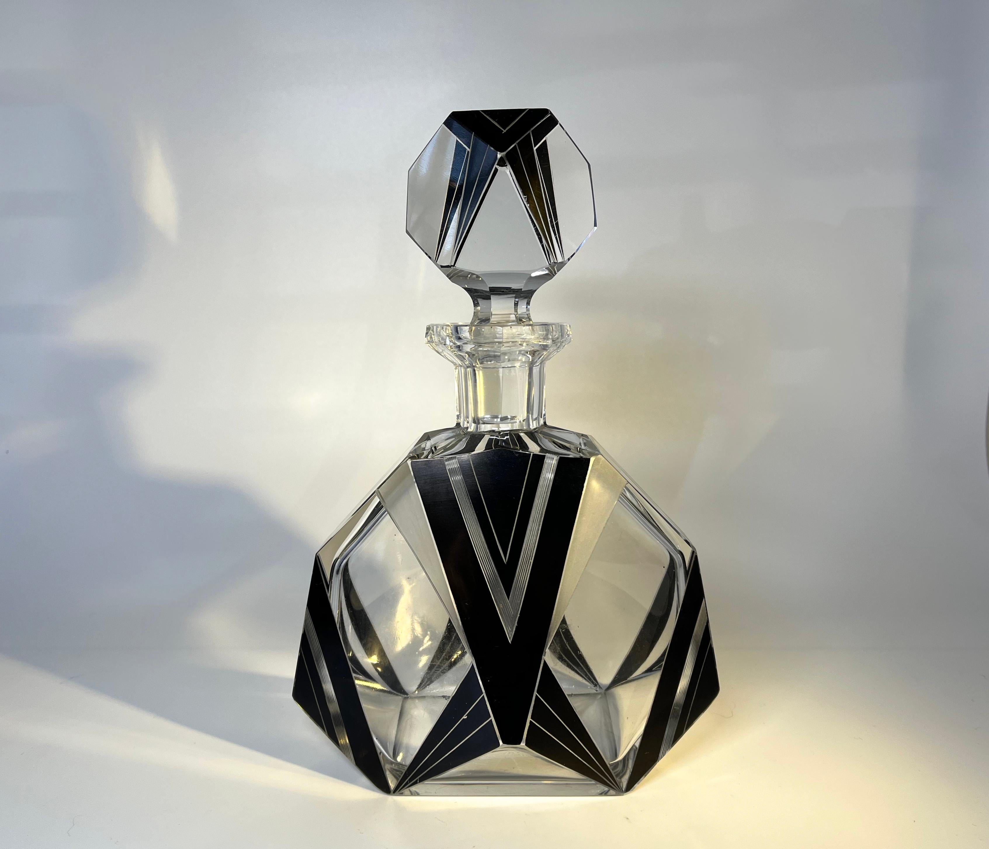 Showstopping and voguish, oversized Czech crystal Art Deco flacon with black enamel geometric pattern
Perfect size for either cologne or liqueur
A superbly stylish weighty decanter and faceted crystal stopper,
Vintage Bohemian, Czech crystal