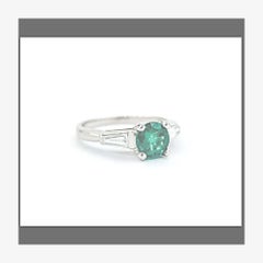 Striking Emerald & Diamond Ring in Platinum