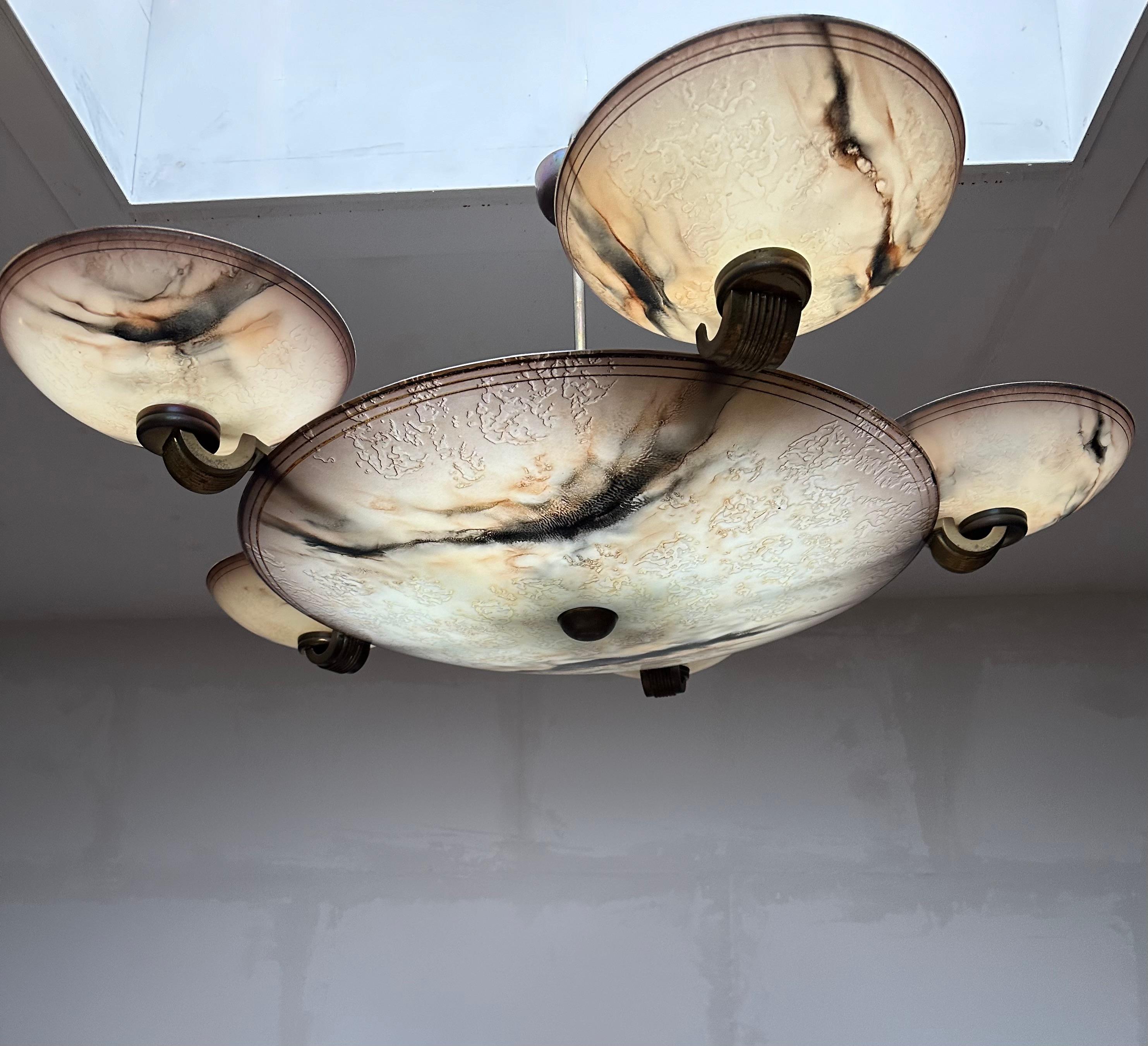 Wonderful and exclusive 1930s lighting ART for the perfect atmosphere by Meissen

If you are looking for a remarkable chandelier to grace your living space then this almost antique Art Deco fixture from circa 1930 could very well be perfect. The