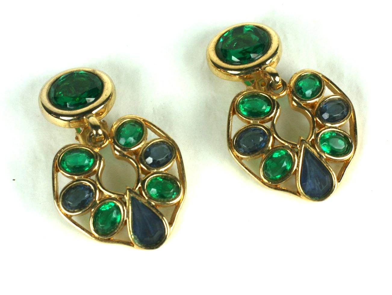 Striking Faux Emerald and Sapphire Dangle Ear Clips from the 1980's. High quality construction with open back stones and clip back fittings. Gilt metal. 
2.25