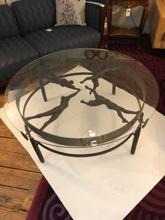Striking Figural Iron and Glass Giacometti Style Coffee Table