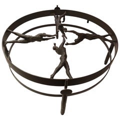 Striking Figural Iron and Glass Giacometti Style Coffee Table