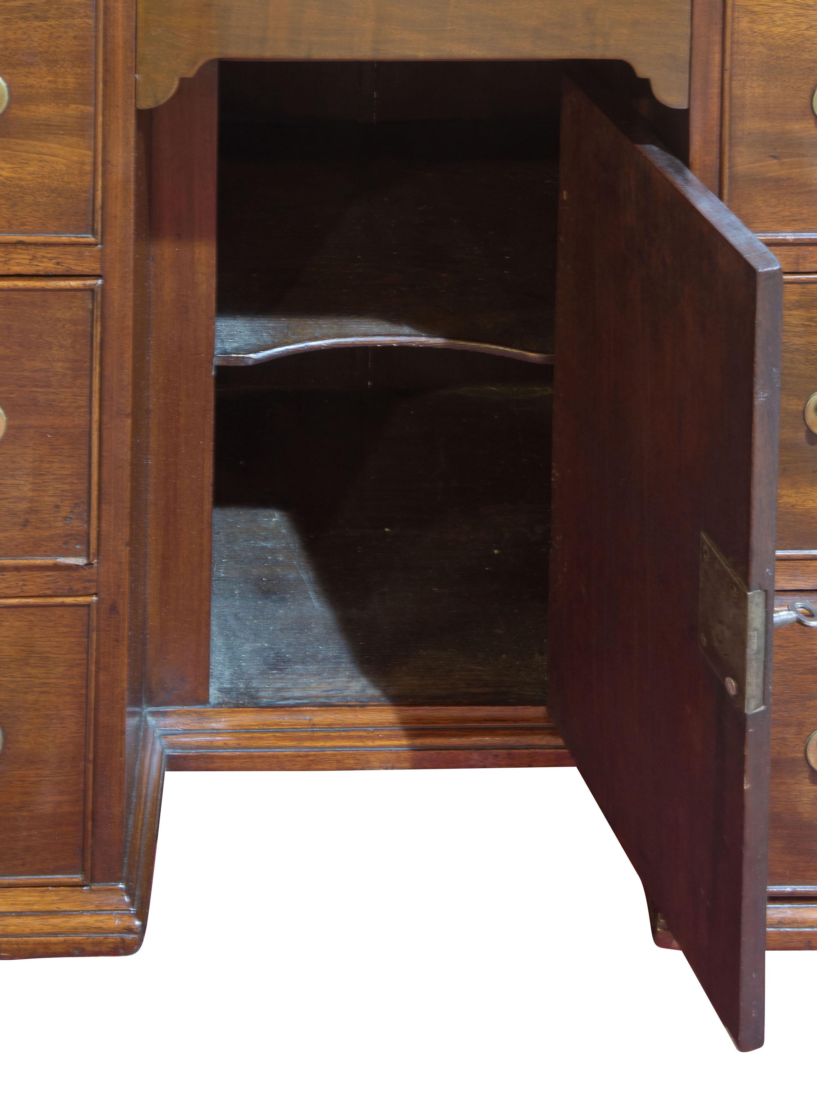 19th Century Striking George III Mahogany Kneehole Desk with Original Hardware For Sale