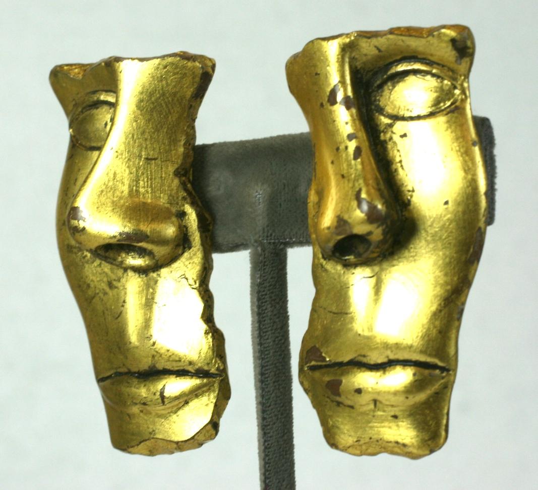 Unusual Gold Leaf Face Earrings from the 1980's. Very striking scale with antique gold leaf finish.
Designed to look like fragments of antique ruins, very lightweight resin with posts. 
1980's USA.
2