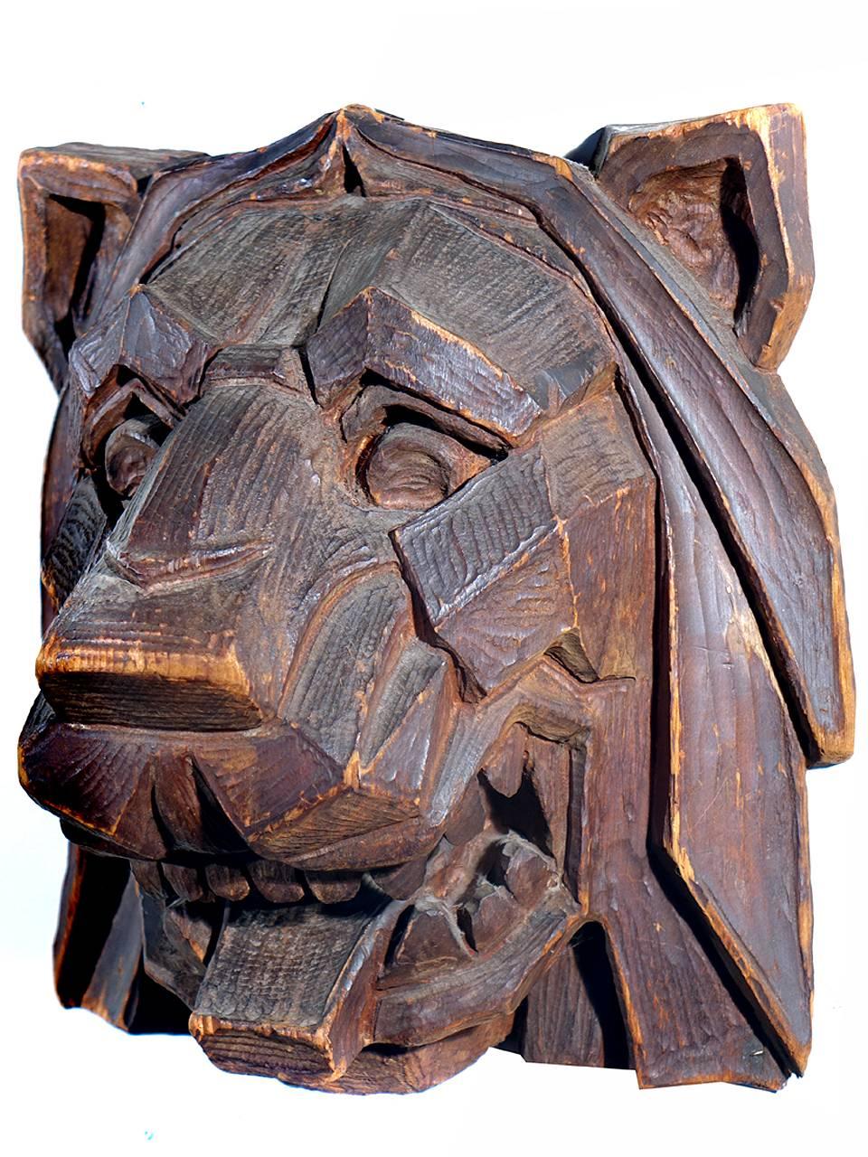 We recently acquired a small group of early Folk Art from the estate of a long time collector and dealer. Of all the objects this Lion is the one we were most drawn to. Its carved in a Classic and severe deco style. It's also so well done it could