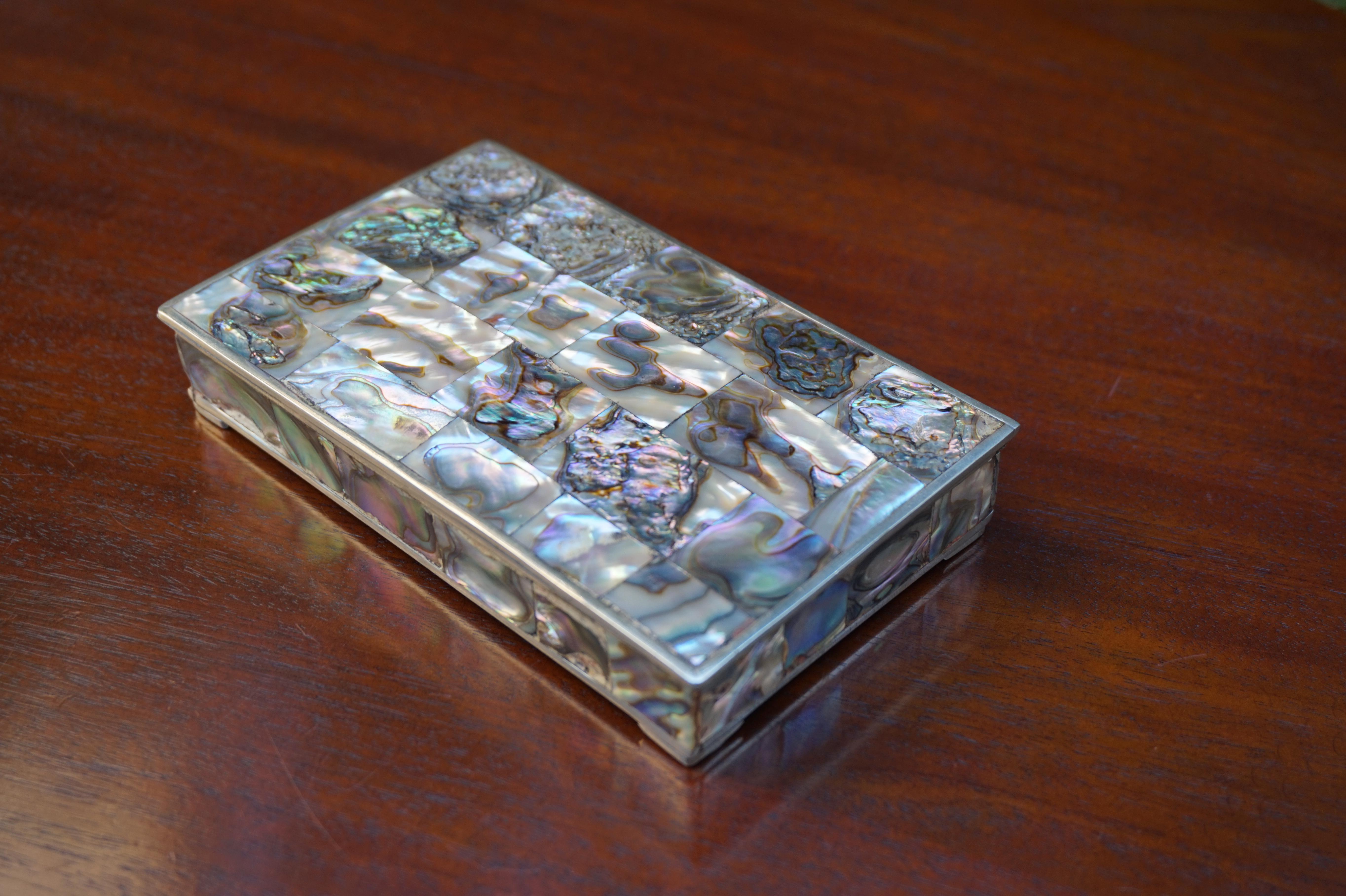 All handcrafted and highly stylish box from the 1950s.

If you are looking for a truly beautiful box for yourself or maybe as a gift for that special someone in your life then this rare and all handcrafted gem could be perfect. We love everything