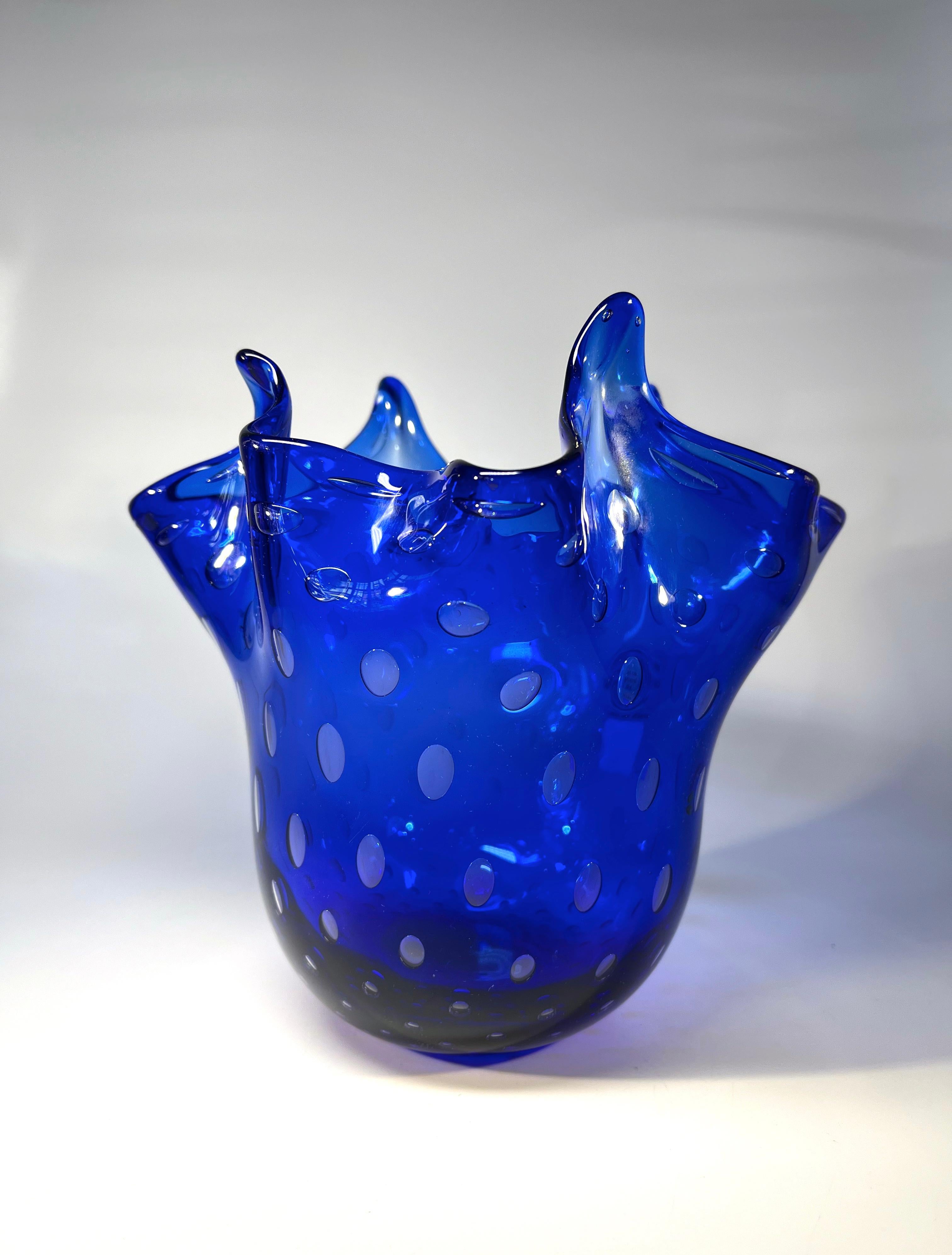 Fabulous lapis lazuli blue glass handkerchief vase from Gambaro & Poggi, Murano
Hand blown creating amazing texture and shape,  this is a stand out classic piece of vintage Italian art glass
Circa 1974
Signed to base. Has original labels
Height 7