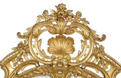 Striking large 19th Century gilt wood + gesso Oval wall mirror.