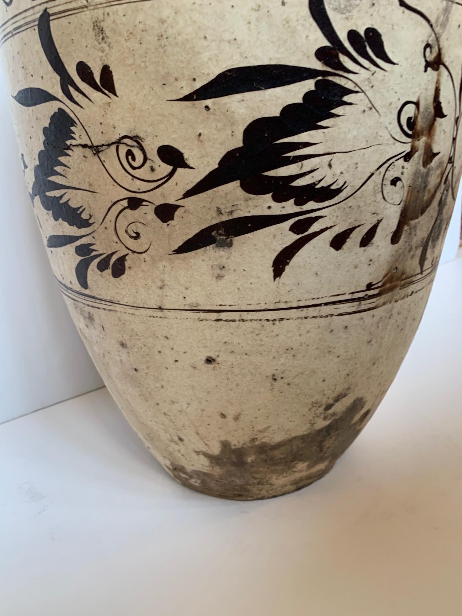A striking white and black 18th century quite large Cizhou stoneware vessel.
Top opening 3.25