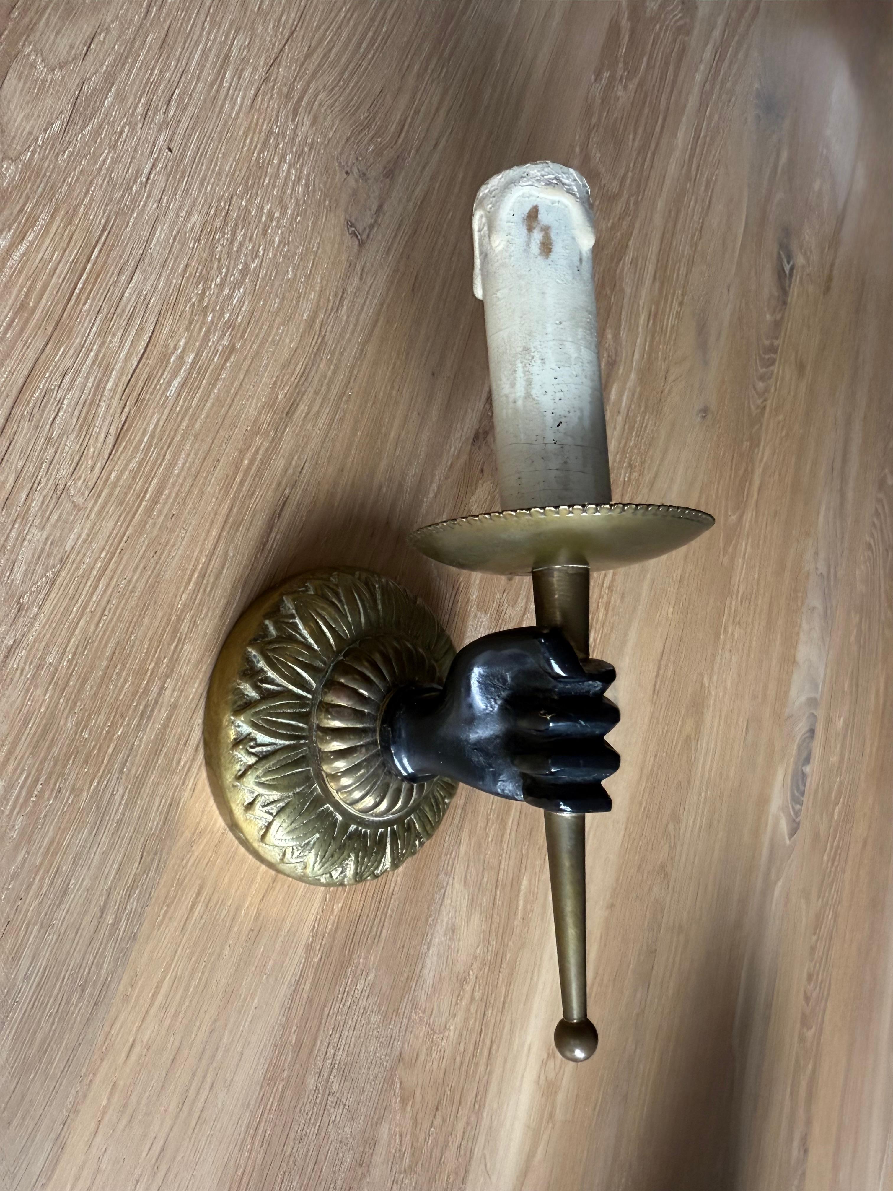 Mid-Century Modern Striking Maison Baguès Style Bronze Hand Holding Torch Wall Sconce For Sale