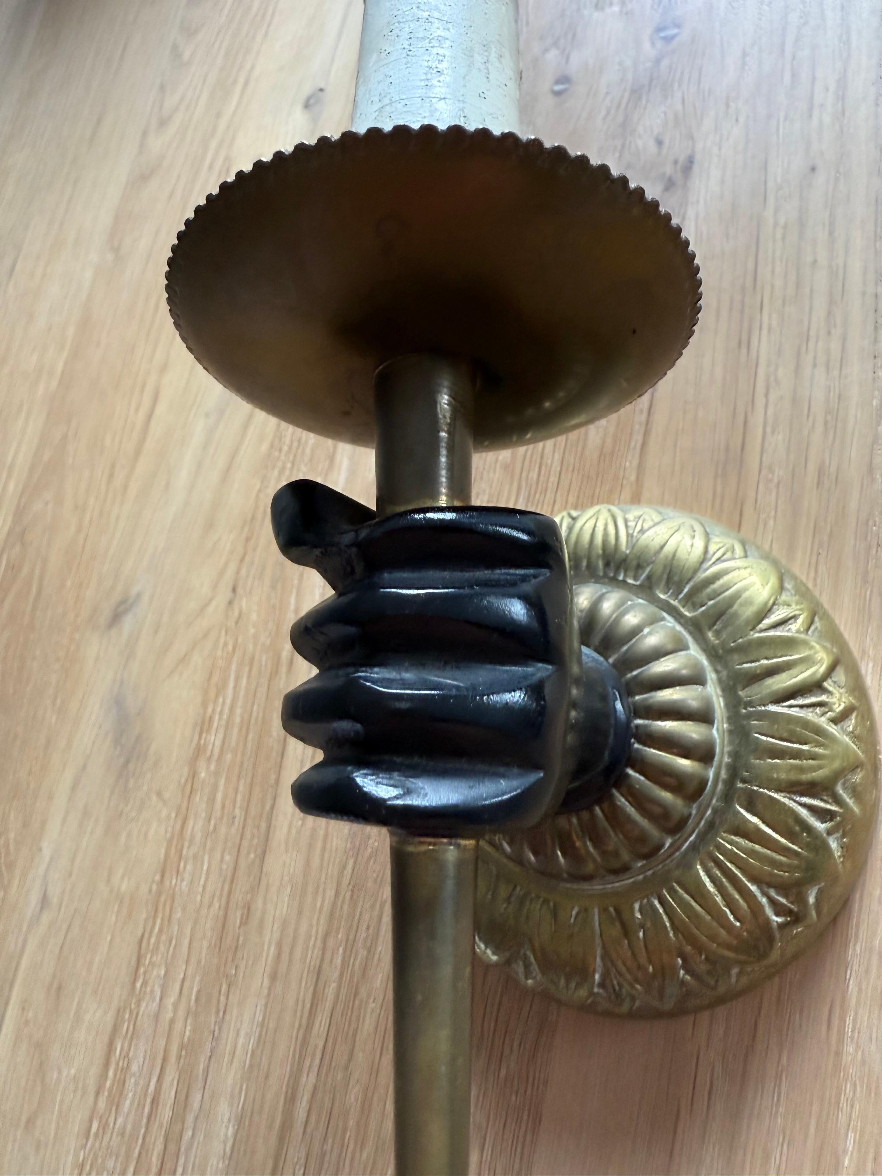 Hand-Crafted Striking Maison Baguès Style Bronze Hand Holding Torch Wall Sconce For Sale