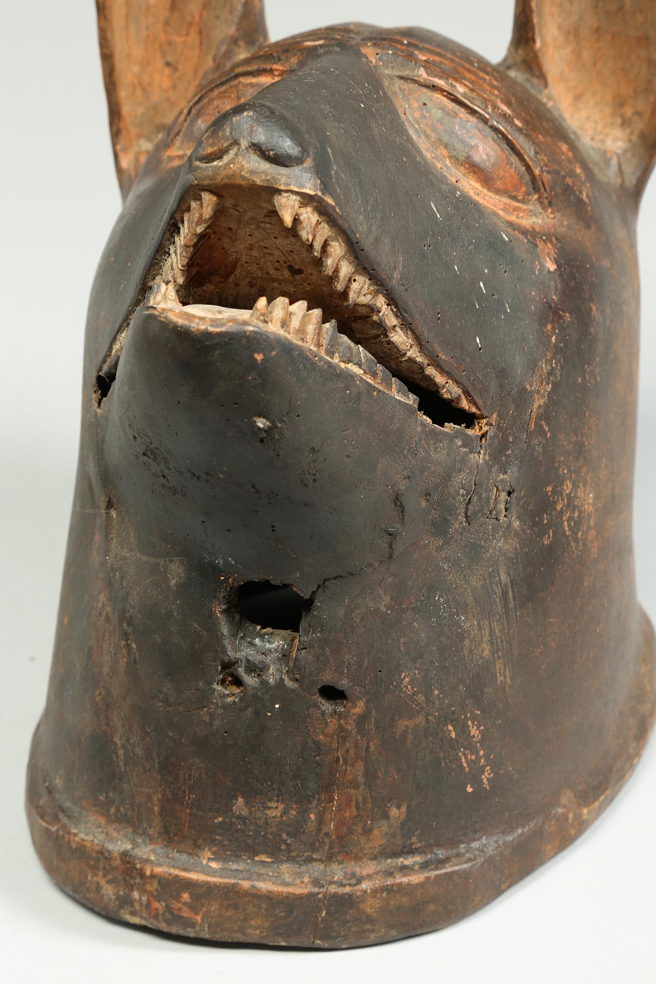 Tanzanian Striking Makonde Animal Helmet Mask, Dog or Hyena, Tanzania, Early 20th C. For Sale