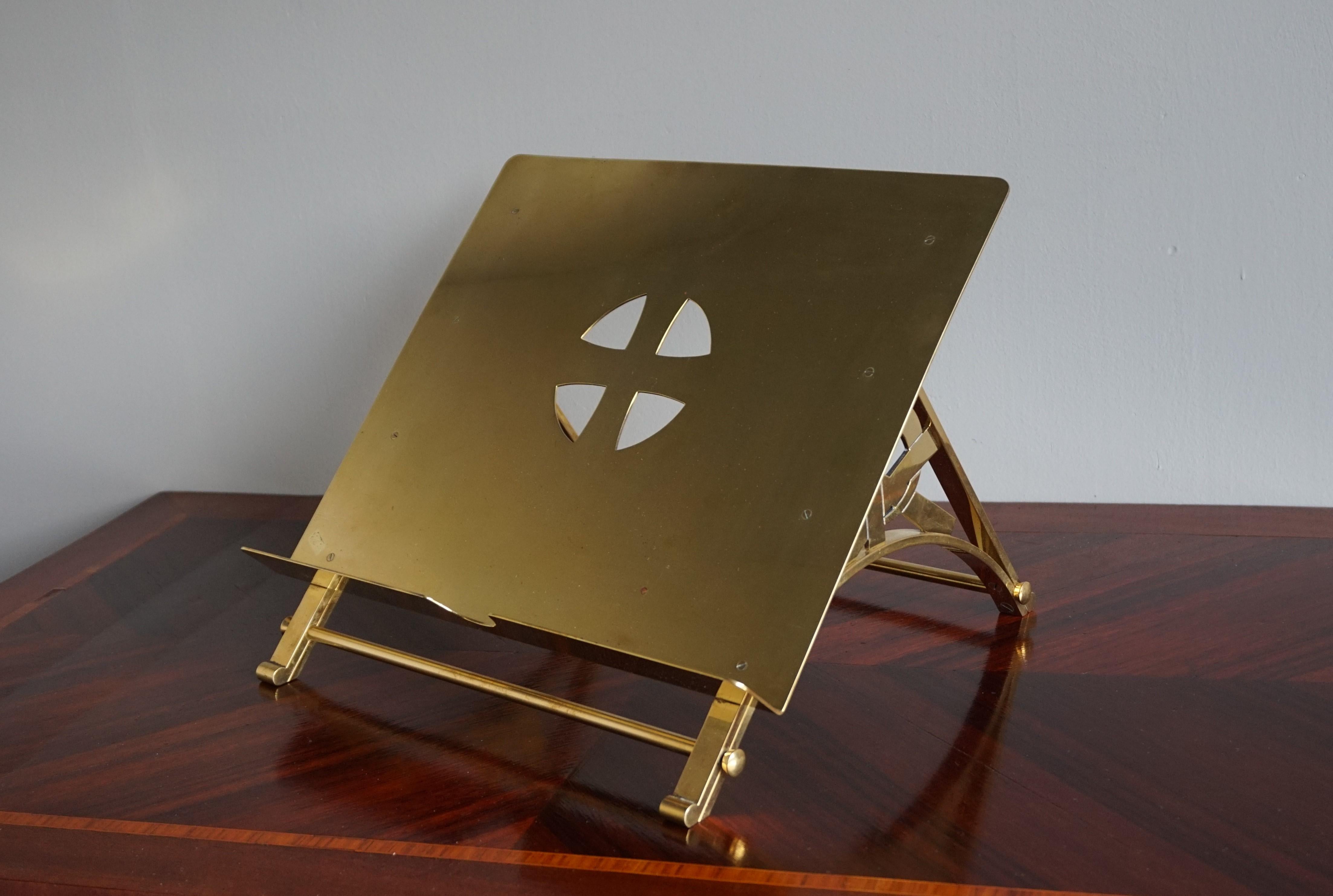 A beautiful design and strong quality, solid brass stand for placing your bible on.

Over the years we have sold many ecclesiastical antiques, but you hardly ever find any from the midcentury modern era. The solid brass base with the golden finish