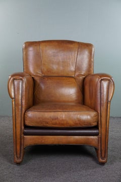 Striking modern design armchair made of high-quality sheepskin leather