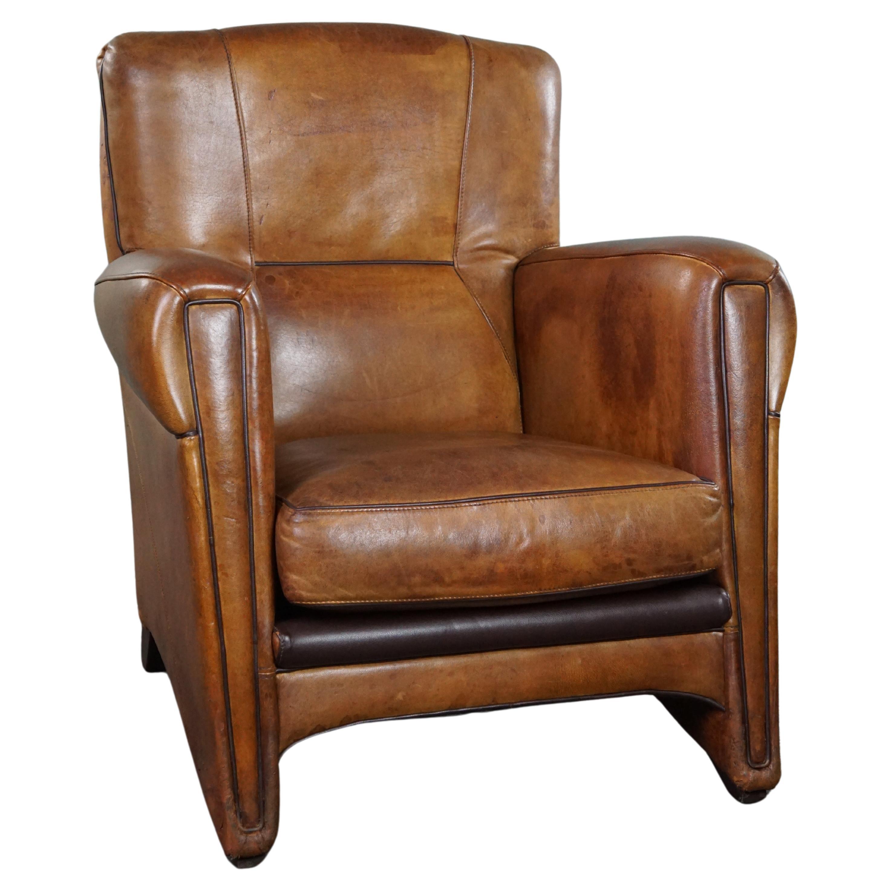 Striking modern design armchair made of high-quality sheepskin leather For Sale