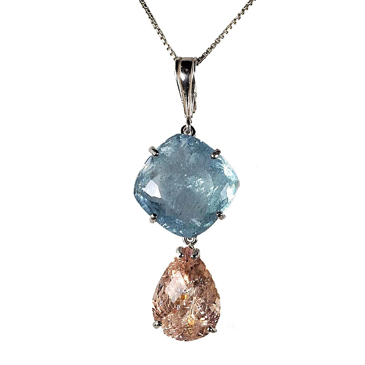 Custom made Sterling Silver Pendant of Blue Aquamarine and Peach Morganite. This lovely beryl pendant features a cushion cut Aquamarine (18 x 18 MM) paired with a pear shape Morganite (18 x 13 MM). The hinged bail fits over your favorite pearls,