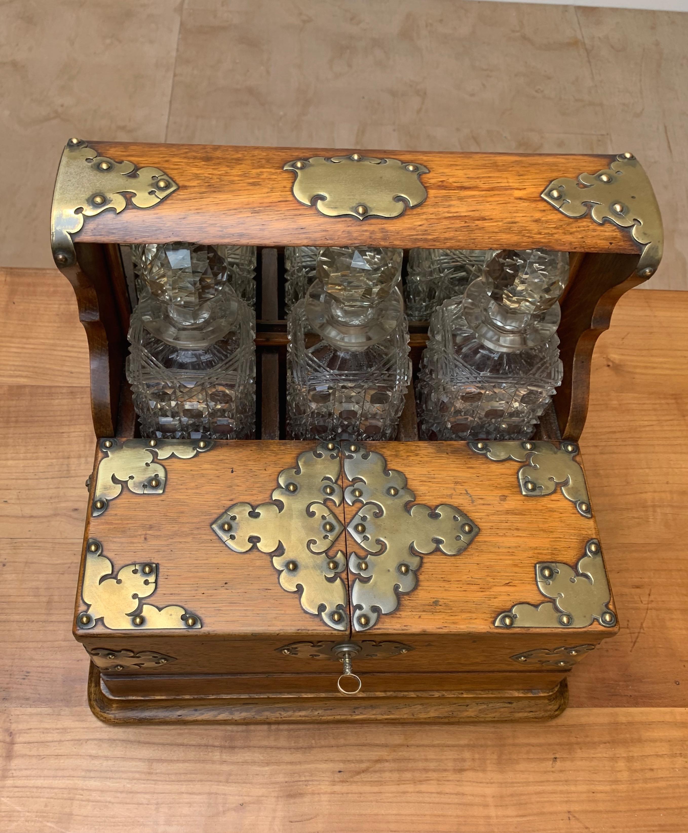 Striking Oak & Brass Tantalus with Whiskey or Liqueur Crystal Decanters & Drawer 10