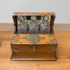 Striking Oak & Brass Tantalus with Whiskey or Liqueur Crystal Decanters & Drawer