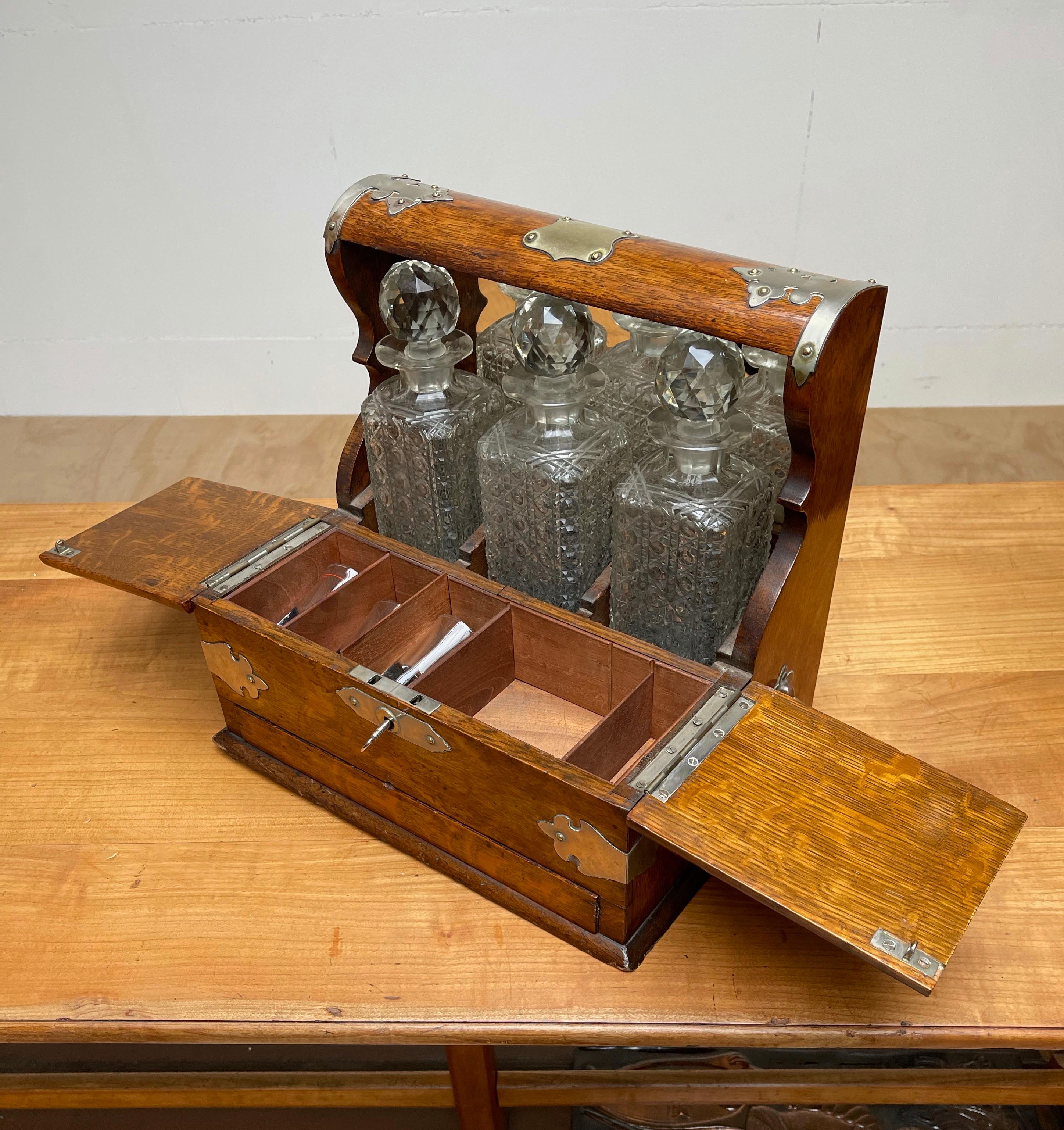 Edwardian Striking Oak & Brass Tantalus with Whiskey or Liqueur Crystal Decanters & Drawer