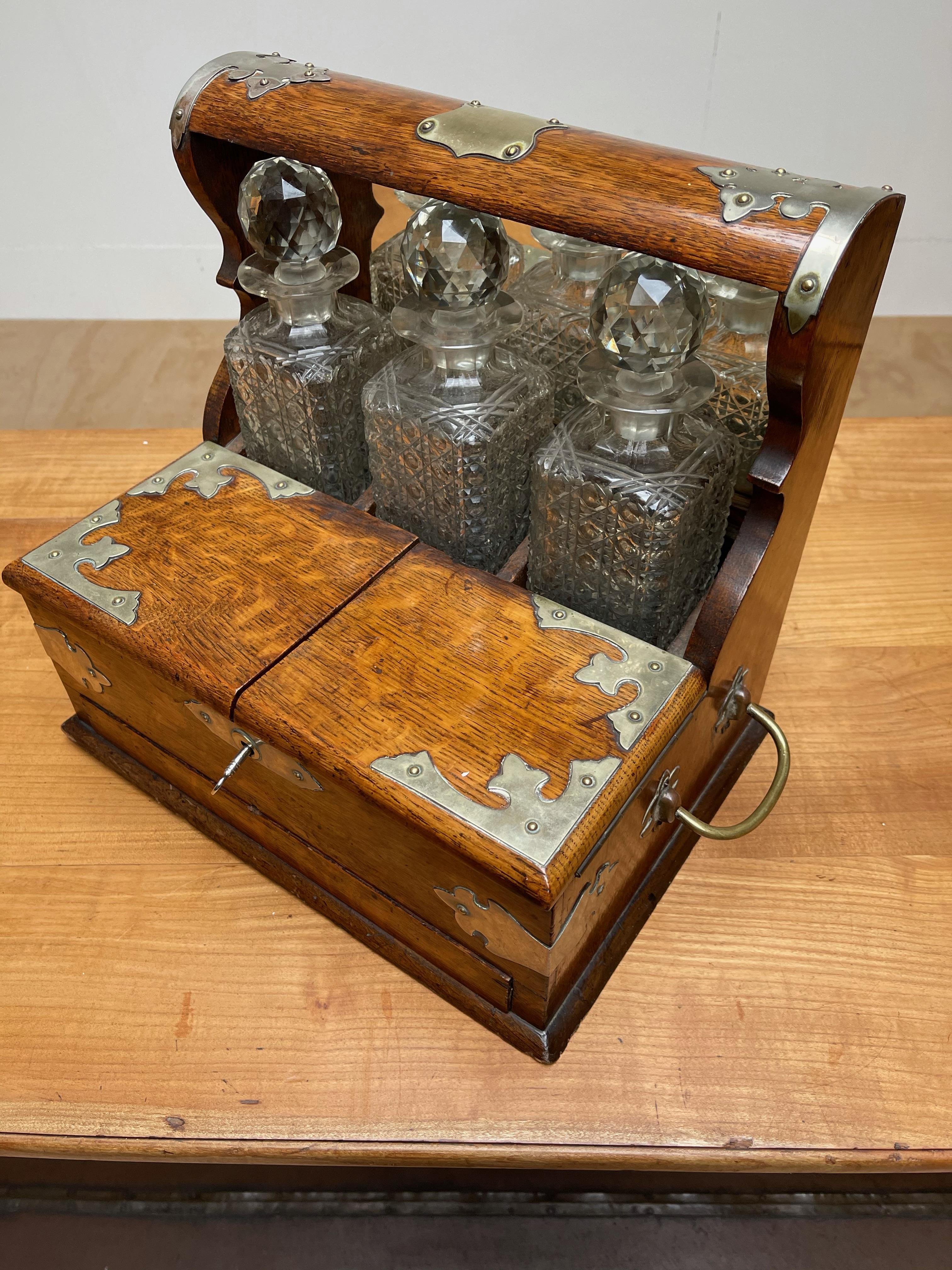 Beveled Striking Oak & Brass Tantalus with Whiskey or Liqueur Crystal Decanters & Drawer