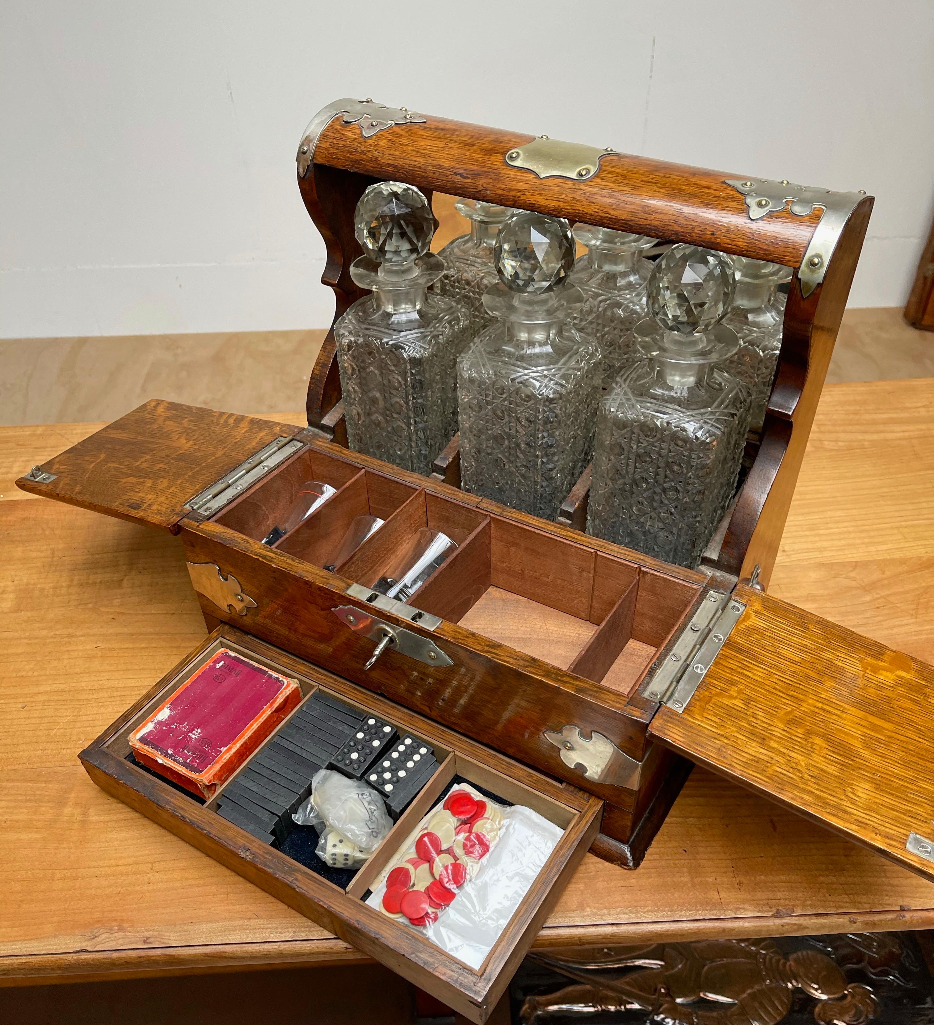 20th Century Striking Oak & Brass Tantalus with Whiskey or Liqueur Crystal Decanters & Drawer