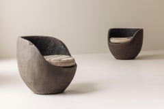 Striking pair lounge chairs sculpted by hand from solid palmwood, 1930s