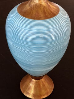 A Striking Pair of American Gerald Thurston Light-Blue Ovoid Ceramic Lamps