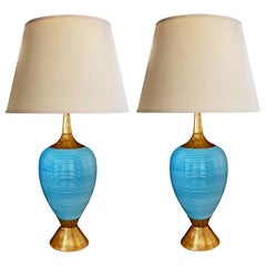 A Striking Pair of American Gerald Thurston Light-Blue Ovoid Ceramic Lamps