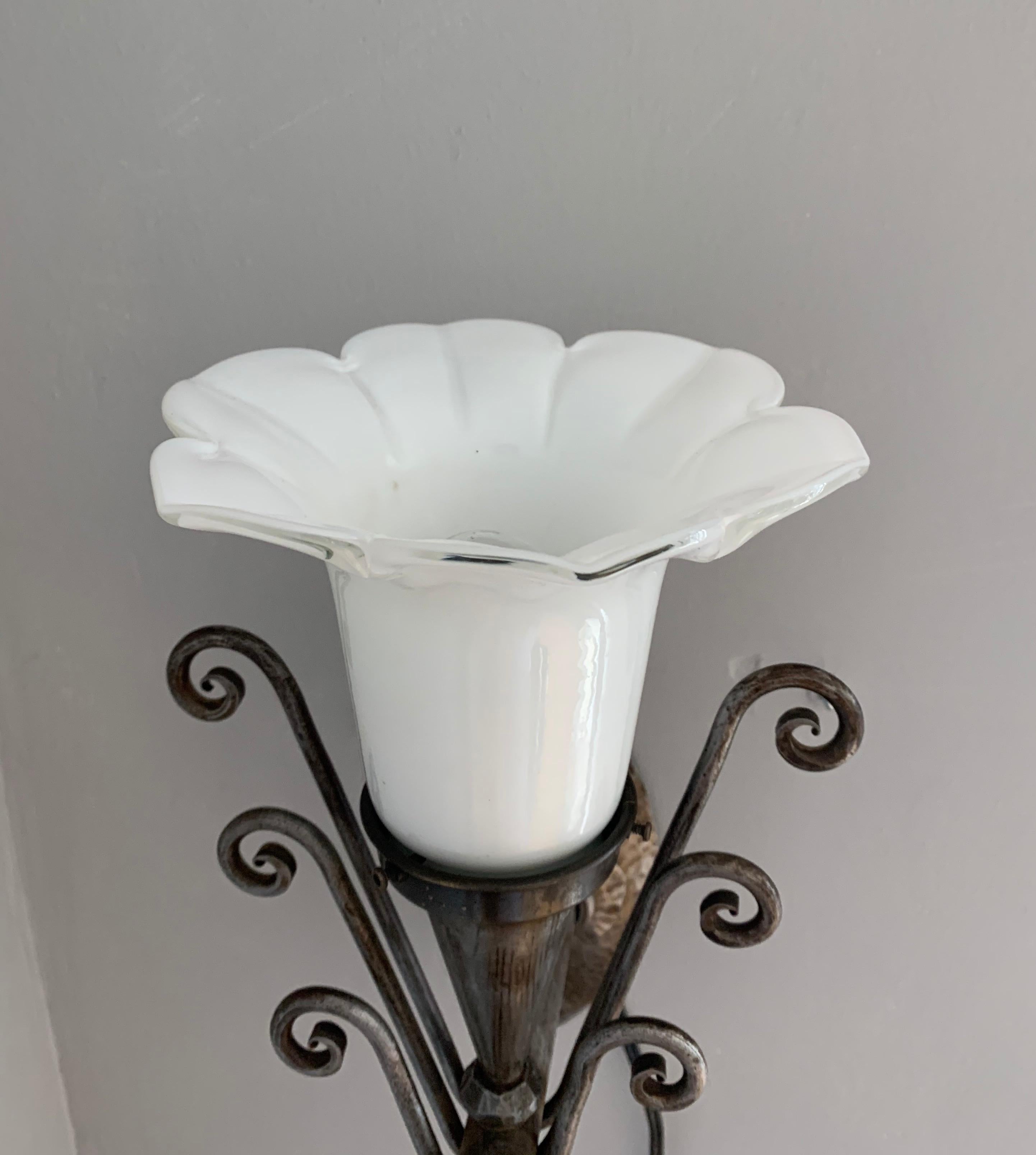 20th Century Striking Arts & Crafts Wrought Iron Wall Sconces with Flowery Glass Shades, Pair