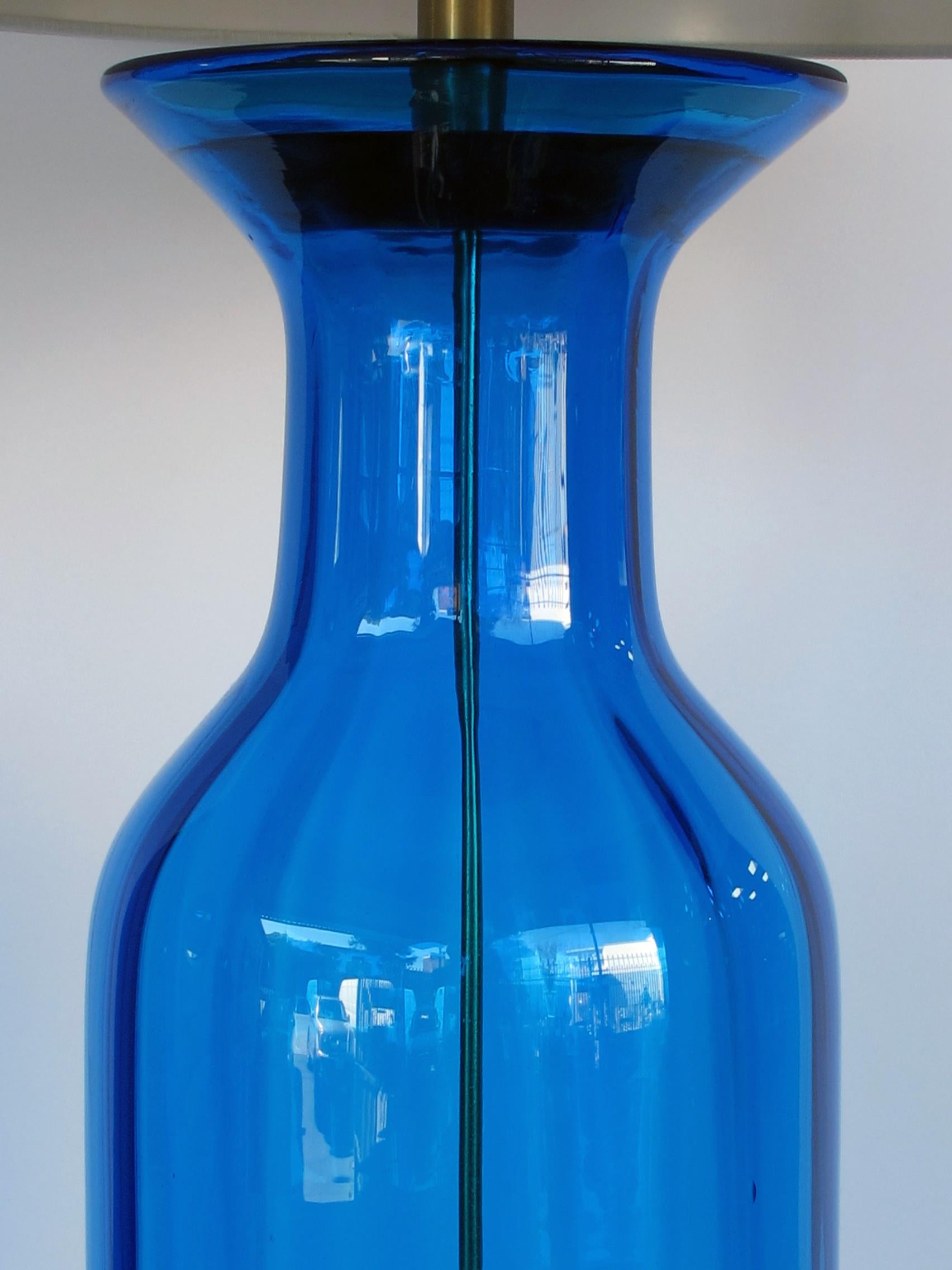 American Striking Pair of Blue Art Glass Bottle-Form Lamps; Possibly By Blenko Glassworks