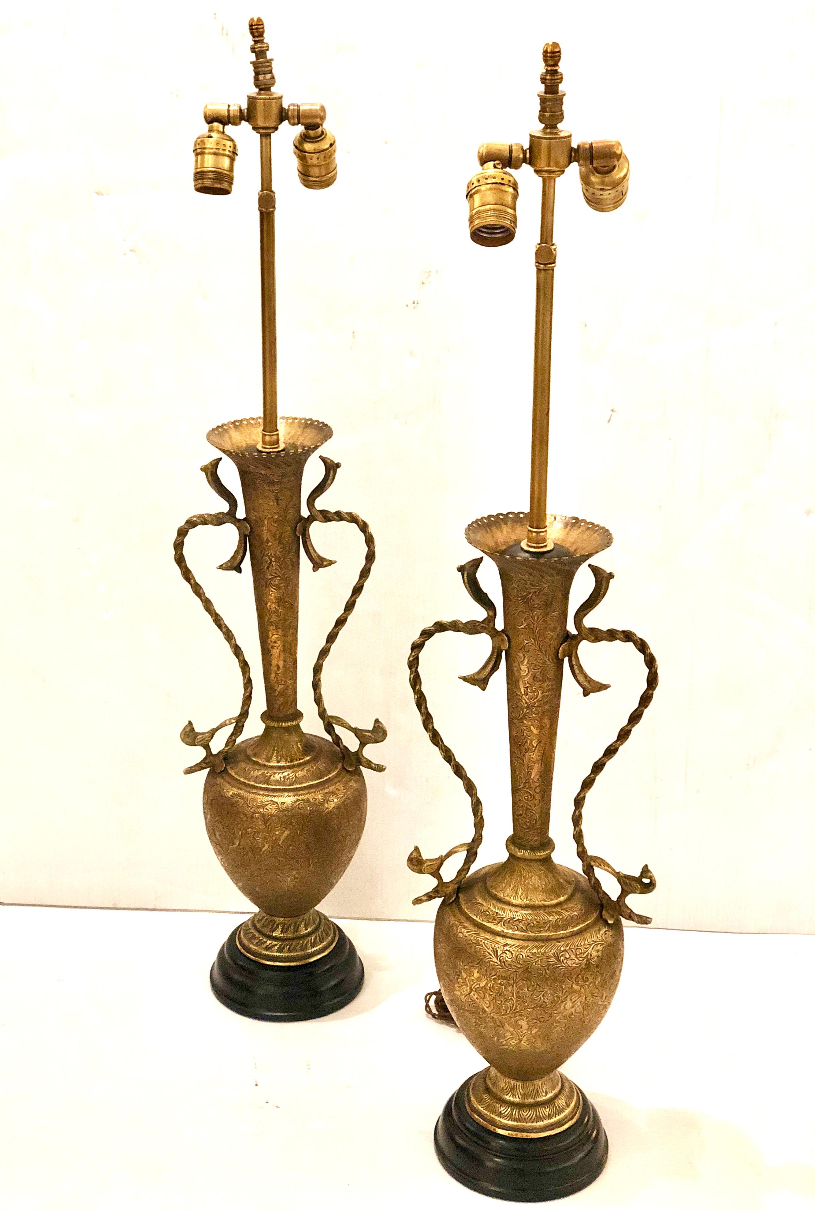 Beautiful pair of Moroccan brass hammered antique table lamps, freshly rewired with cloth cord we believe these are Moroccan but we are not sure lamps are in great condition, and lampshades are not included.