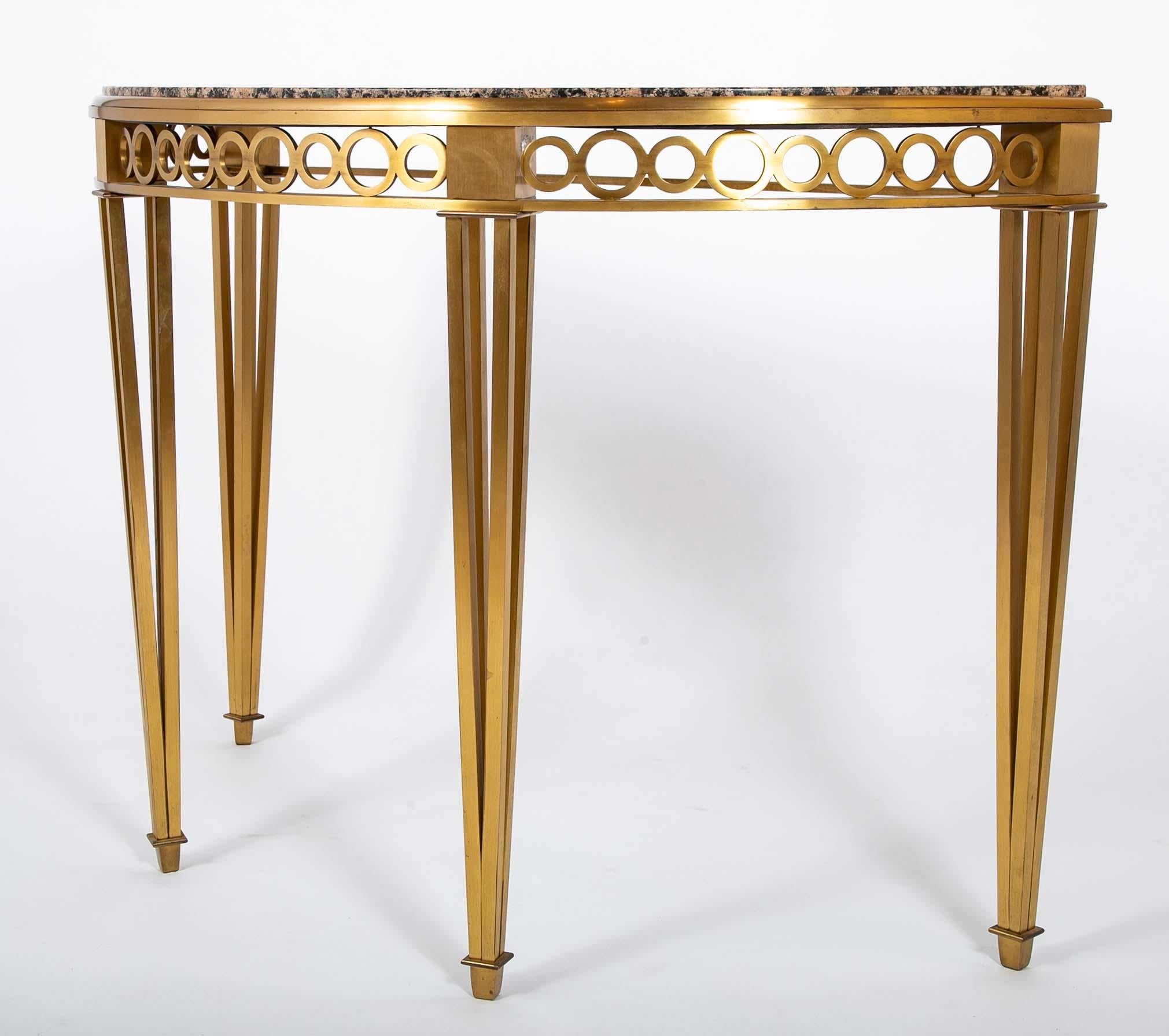 Striking Pair of Bronze Consoles with Fossilized Marble Tops In Good Condition For Sale In Stamford, CT