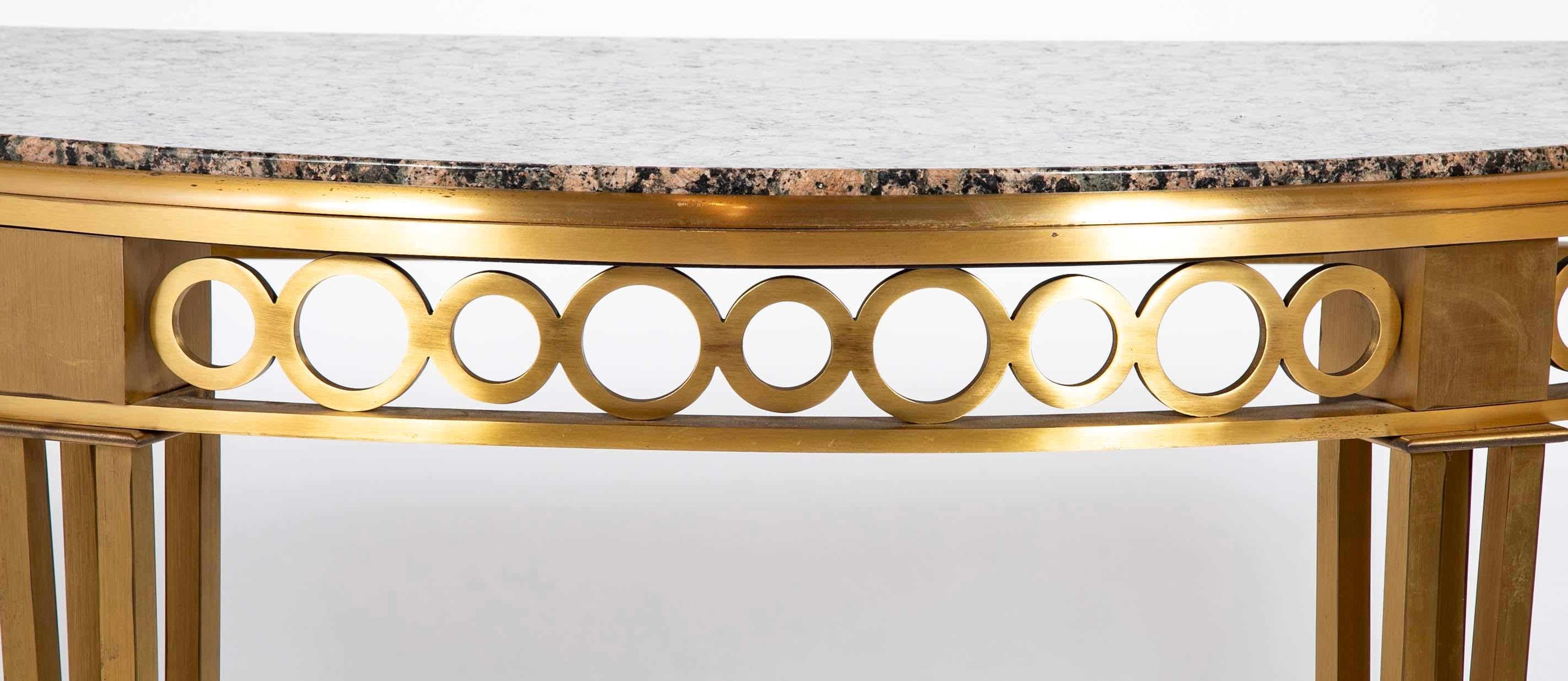 Striking Pair of Bronze Consoles with Fossilized Marble Tops For Sale 4