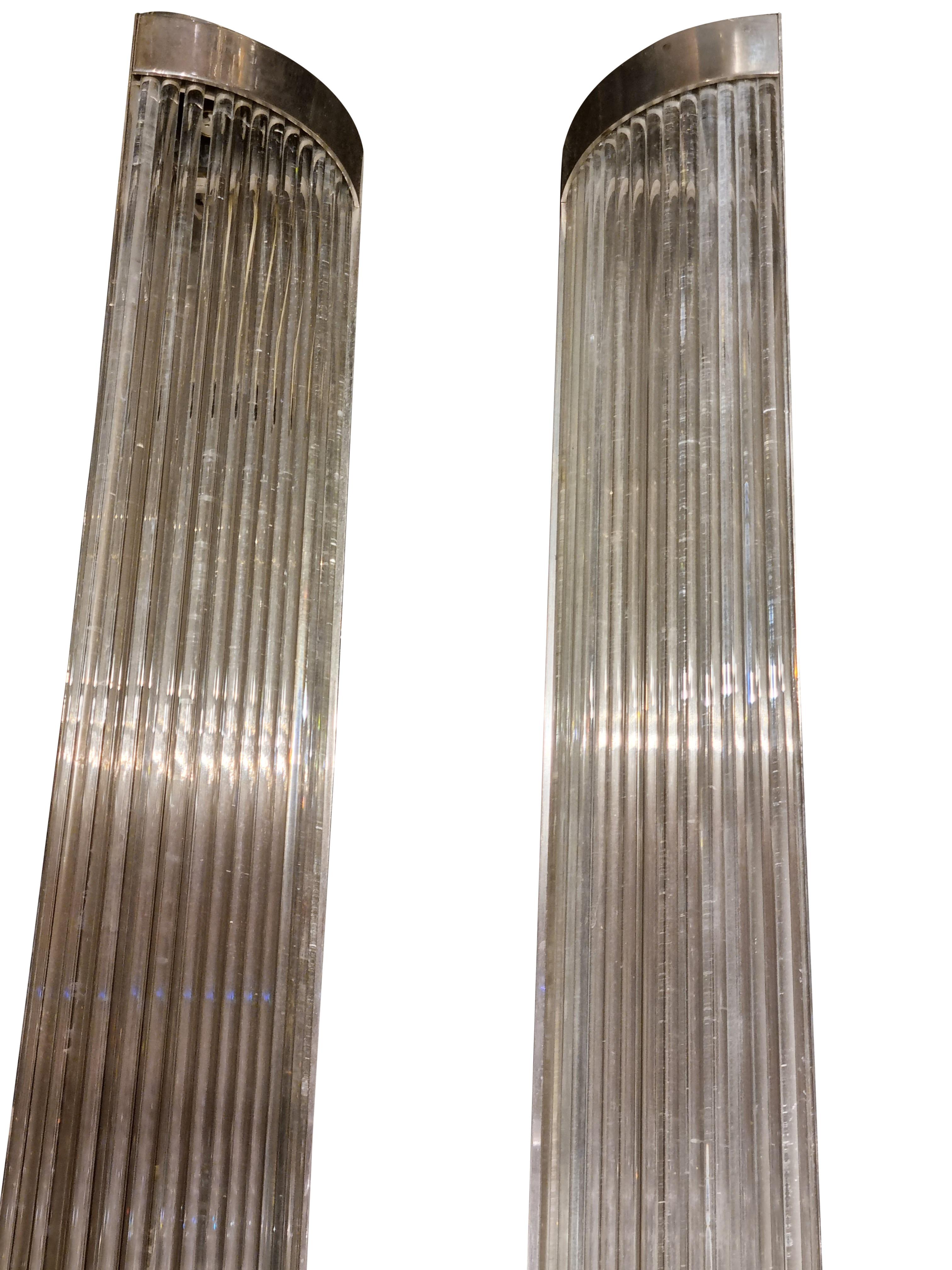 A Striking Pair of Art Deco Style Wall Lights with Crystal Tubular Rods, the Case is made from Polished Steel. We Believe these Wall Lights came out of the Savoy Hotel when they Refurbished